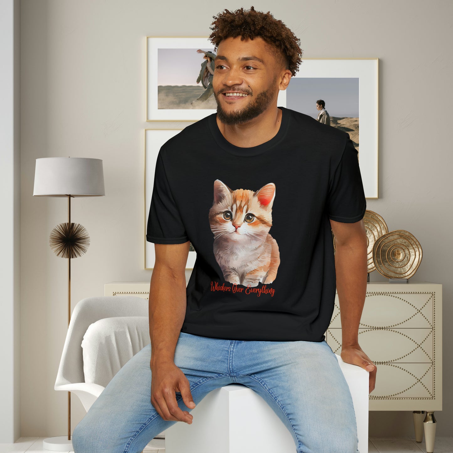A cute cat with “Whiskers over everything” below it on this Unisex Softstyle T-Shirt. Cat lovers get this.