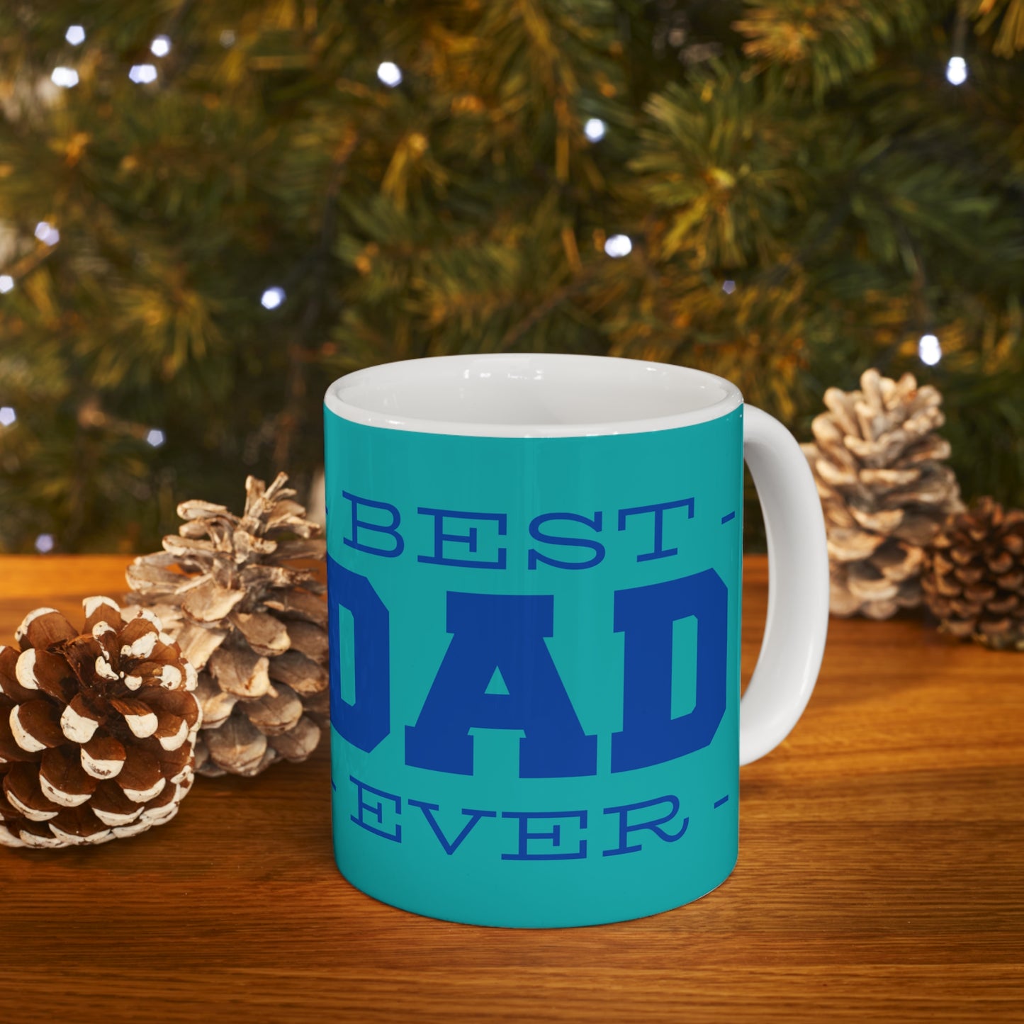 “BEST DAD EVER” on one side and a dad cooking happily with his kid. Part of several mugs to choose from depending on what resonates with you.