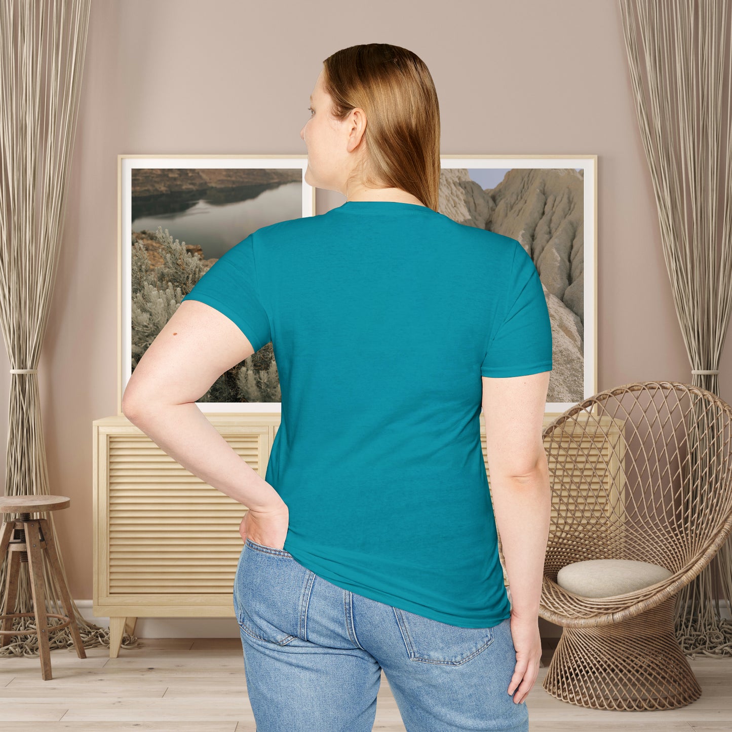 “FOCUS on the good” above a multicolored heart on this Unisex Softstyle T-Shirt.