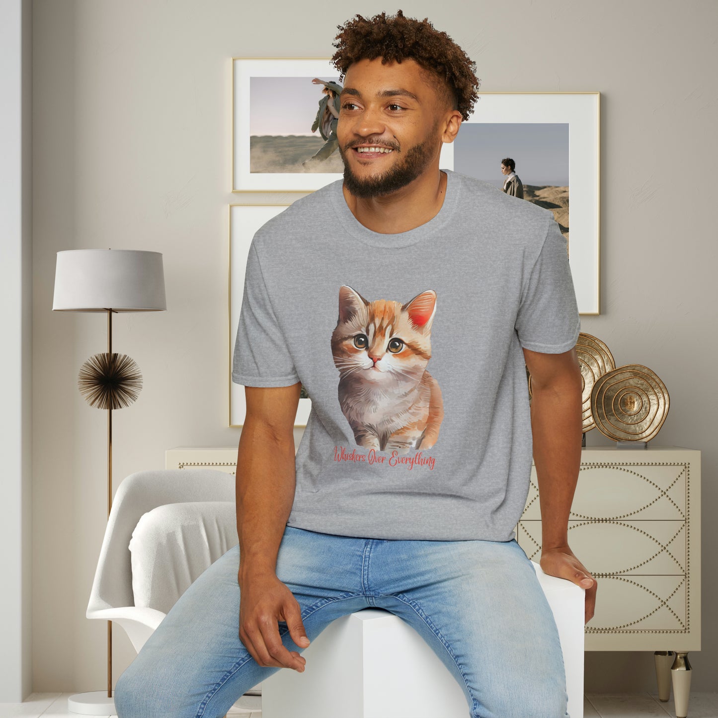 A cute cat with “Whiskers over everything” below it on this Unisex Softstyle T-Shirt. Cat lovers get this.