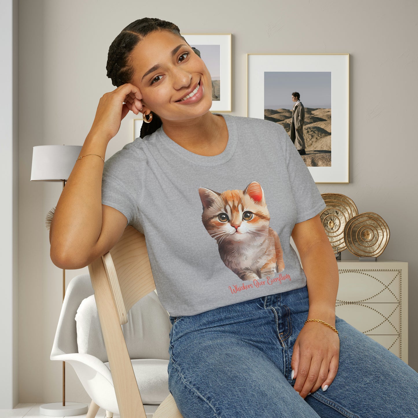 A cute cat with “Whiskers over everything” below it on this Unisex Softstyle T-Shirt. Cat lovers get this.