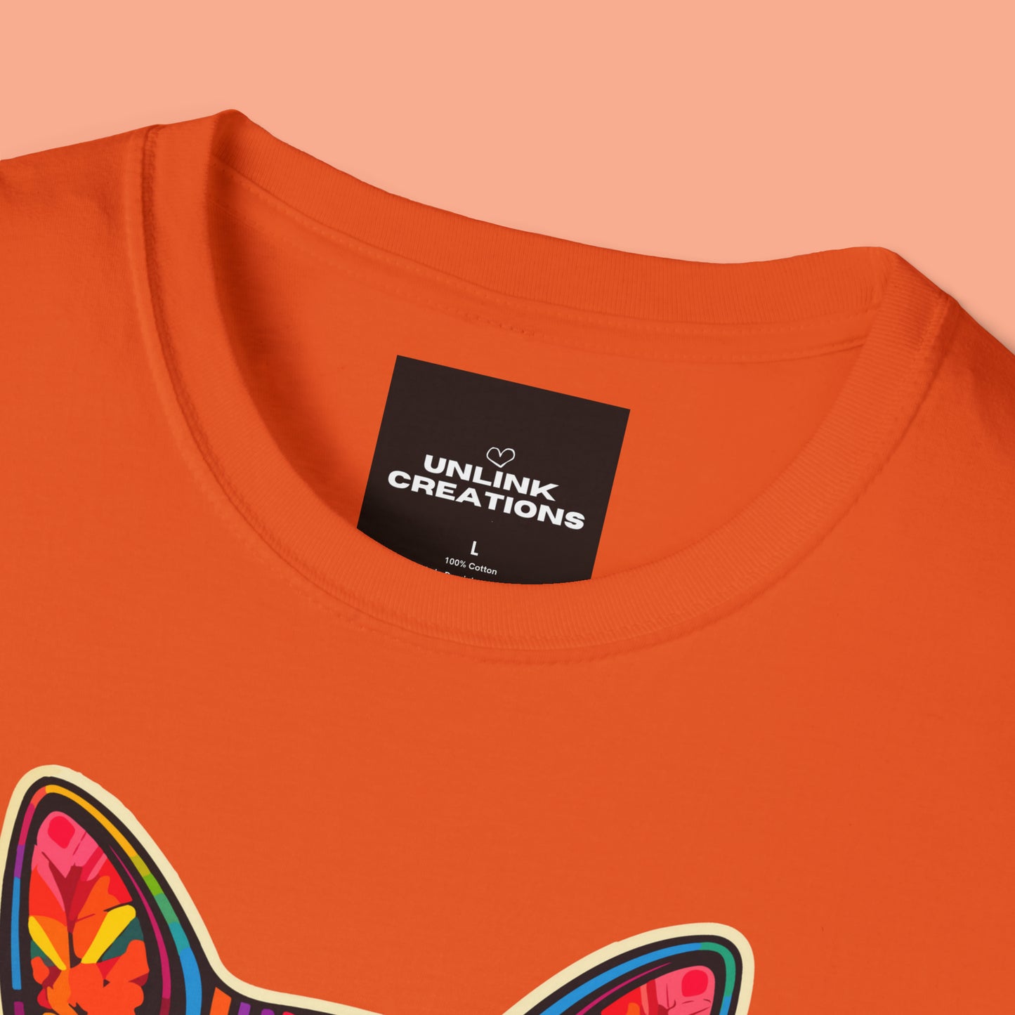 A mesmerizing cat that just pulls you to look into its eyes with “Sassy Cat Club” below it on this Unisex Softstyle T-Shirt.