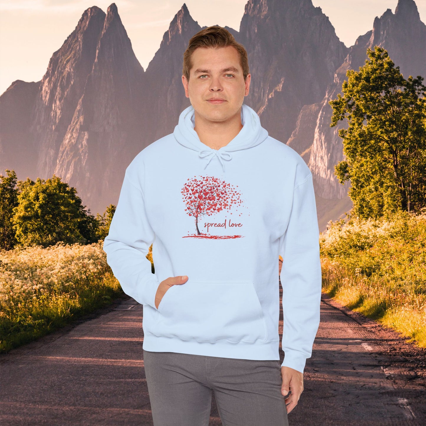 Spread love-heart filled tree Heavy Blend™ Hooded Sweatshirt