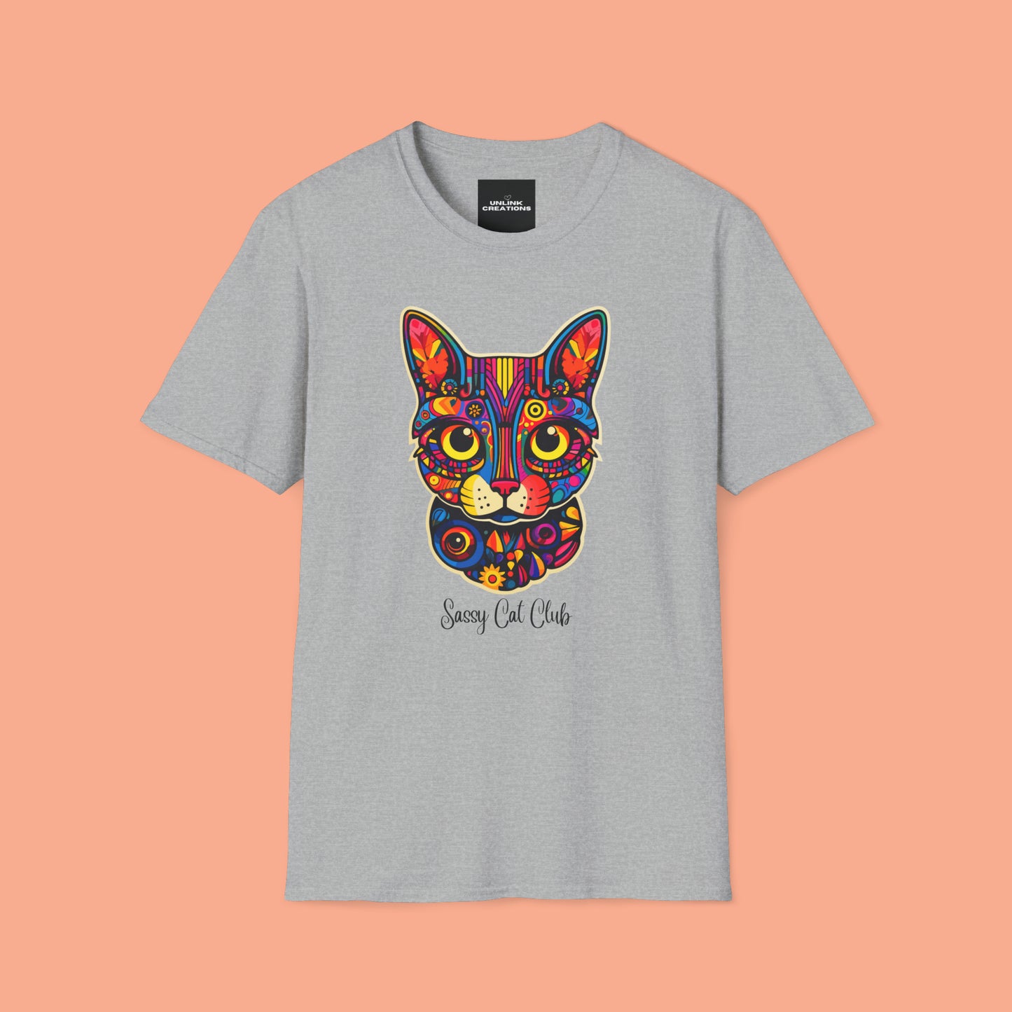 A mesmerizing cat that just pulls you to look into its eyes with “Sassy Cat Club” below it on this Unisex Softstyle T-Shirt.