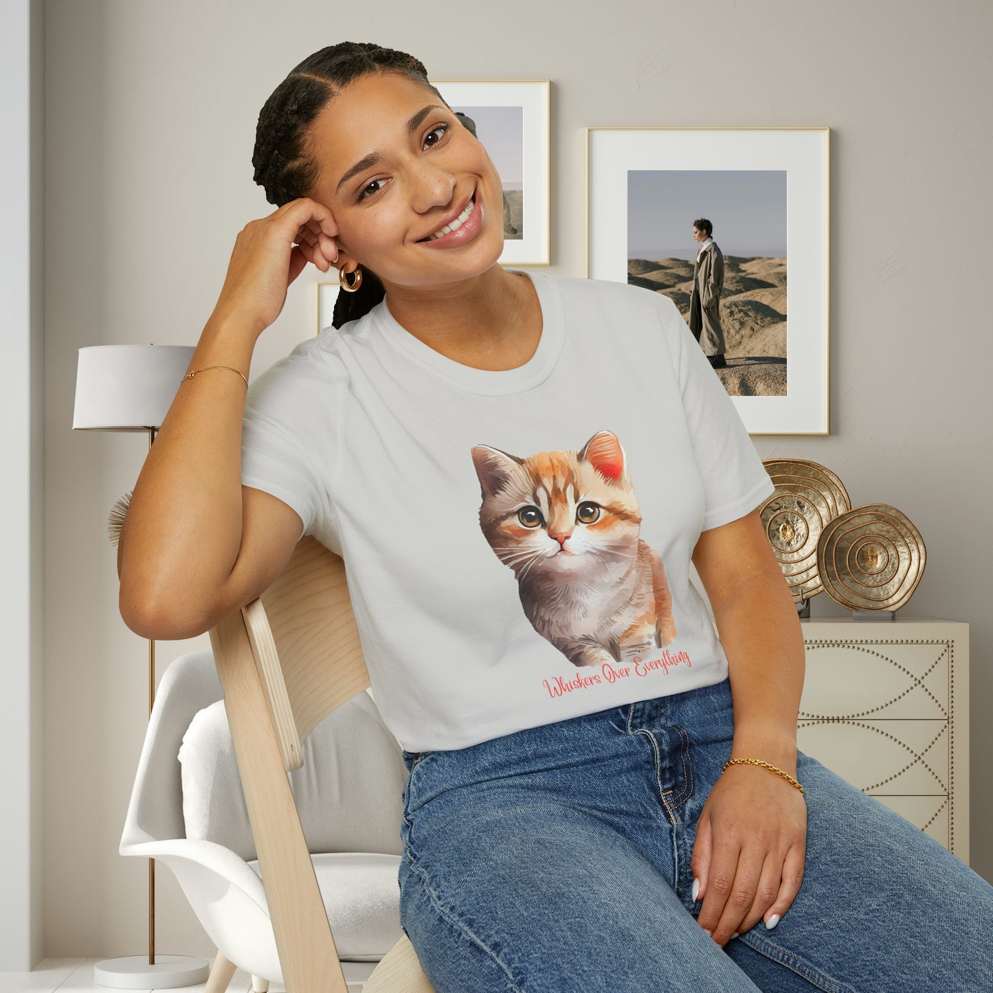 A cute cat with “Whiskers over everything” below it on this Unisex Softstyle T-Shirt. Cat lovers get this.