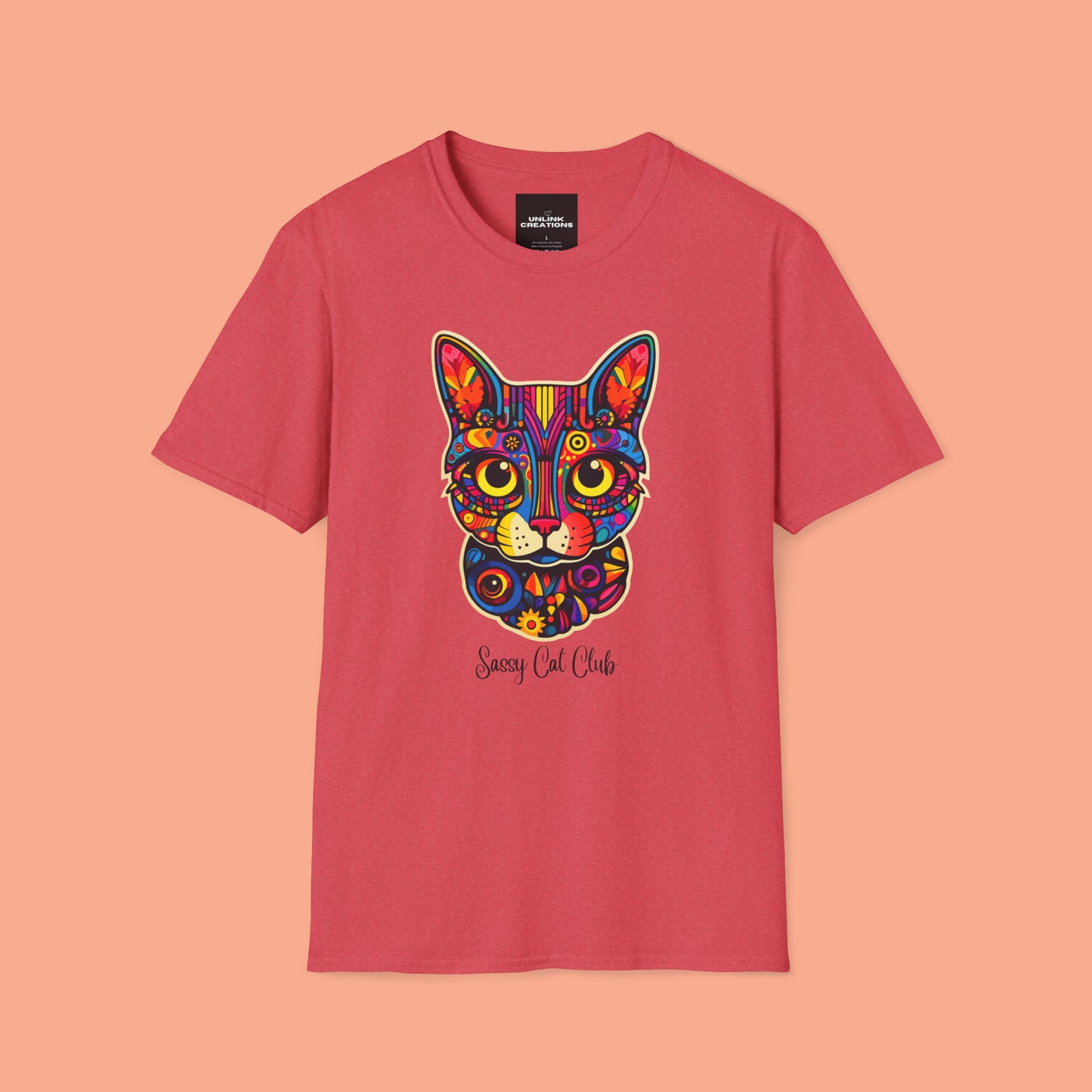 A mesmerizing cat that just pulls you to look into its eyes with “Sassy Cat Club” below it on this Unisex Softstyle T-Shirt.