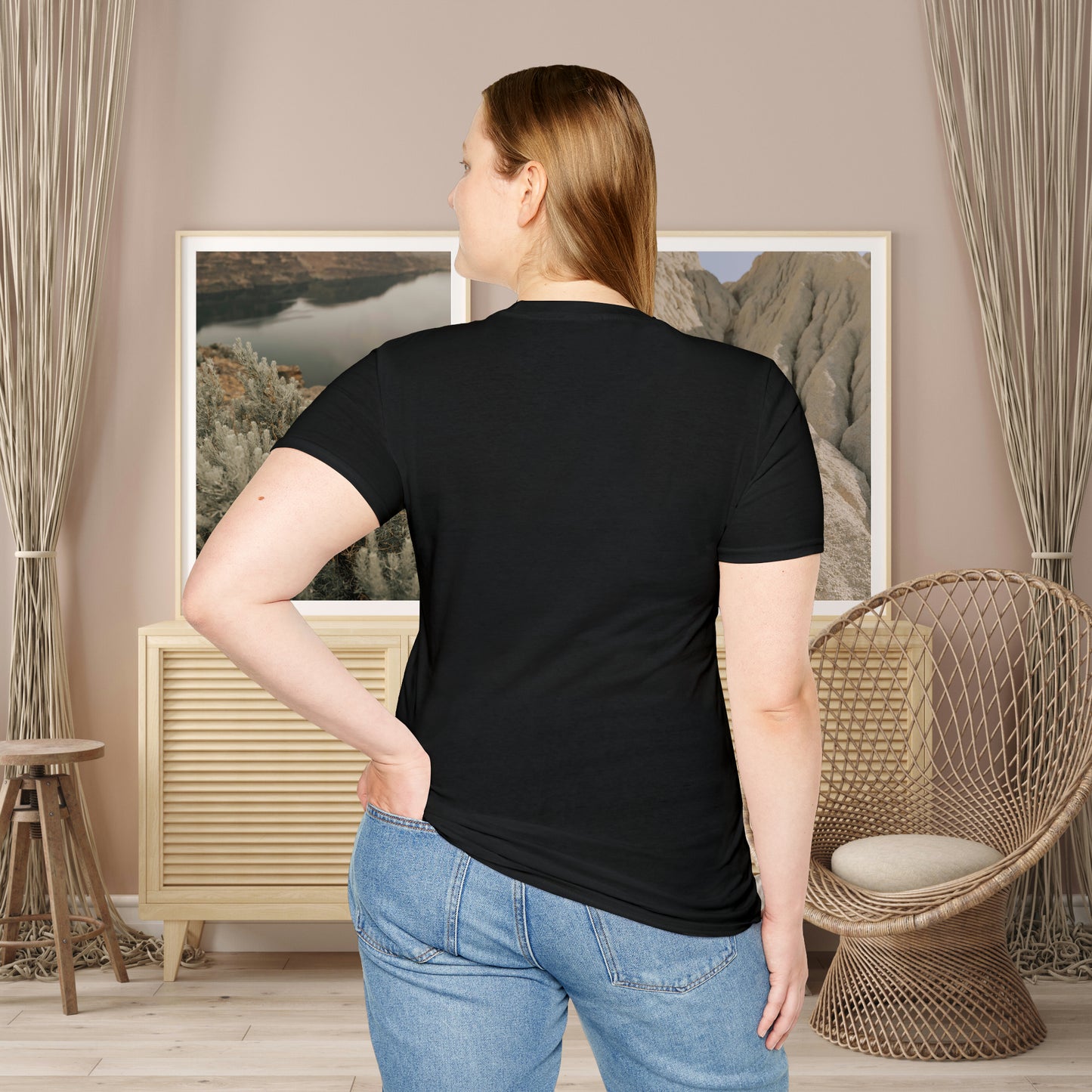 “FOCUS on the good” above a multicolored heart on this Unisex Softstyle T-Shirt.
