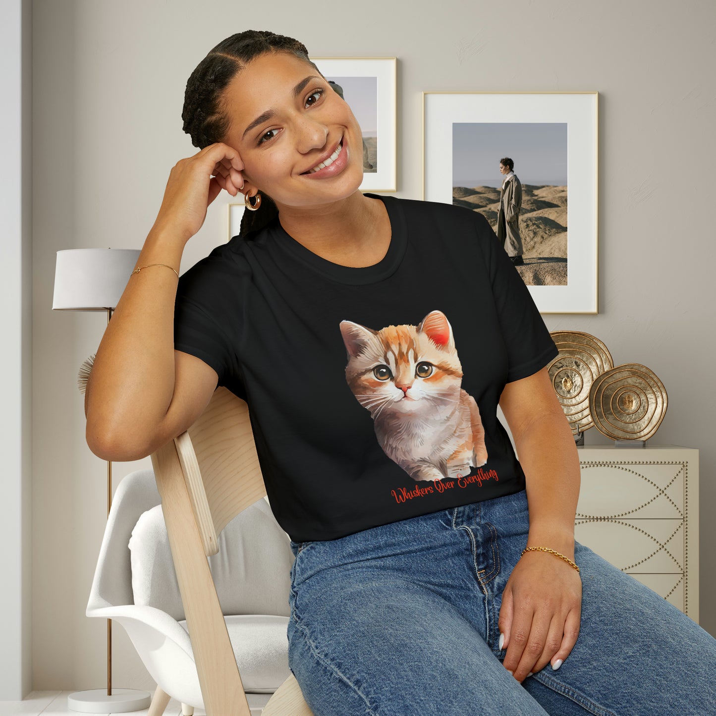 A cute cat with “Whiskers over everything” below it on this Unisex Softstyle T-Shirt. Cat lovers get this.