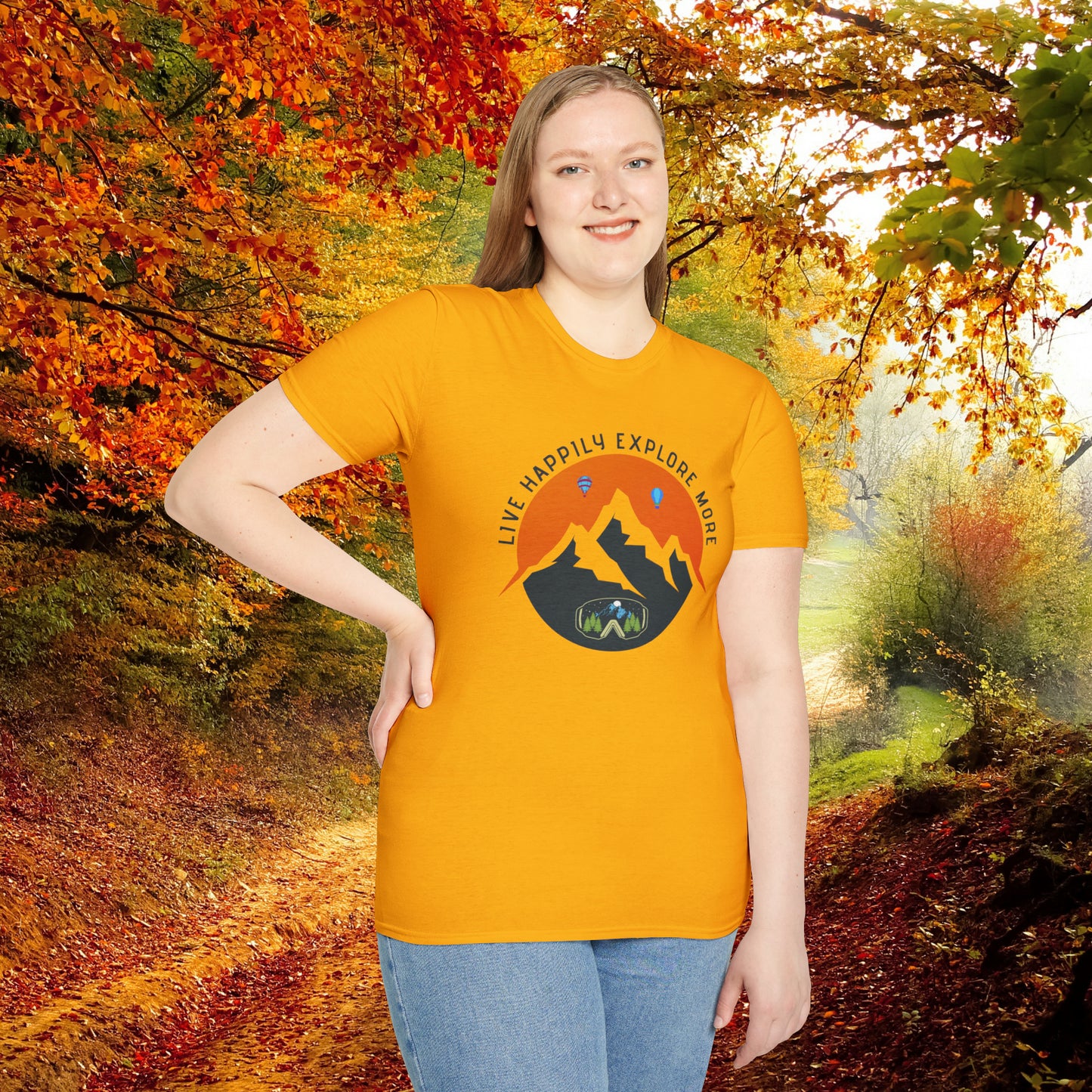 “LIVE HAPPILY EXPLORE MORE” message on this mountain sports inspired Unisex Softstyle T-Shirt.
