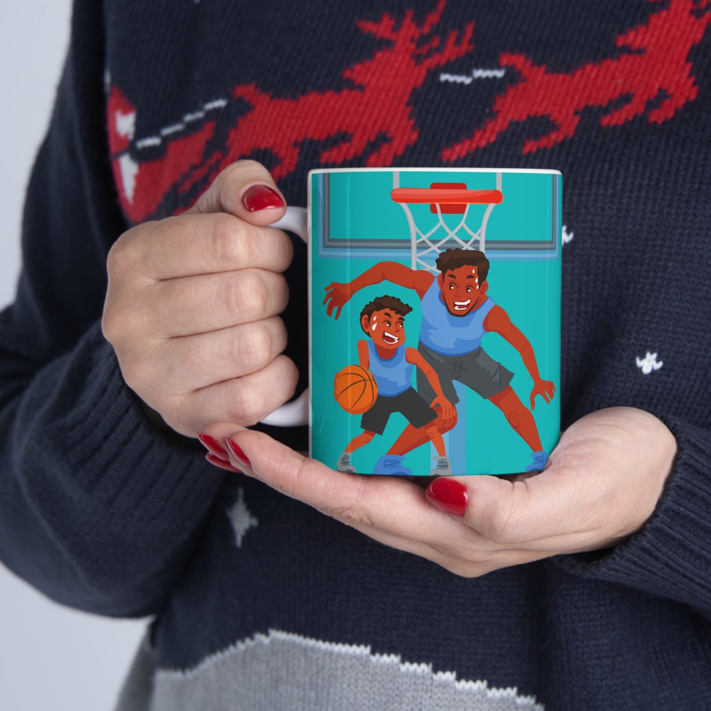 “BEST DAD EVER” on one side and dad happily playing basketball with his son. Part of several mugs to choose from depending on what resonates with you.