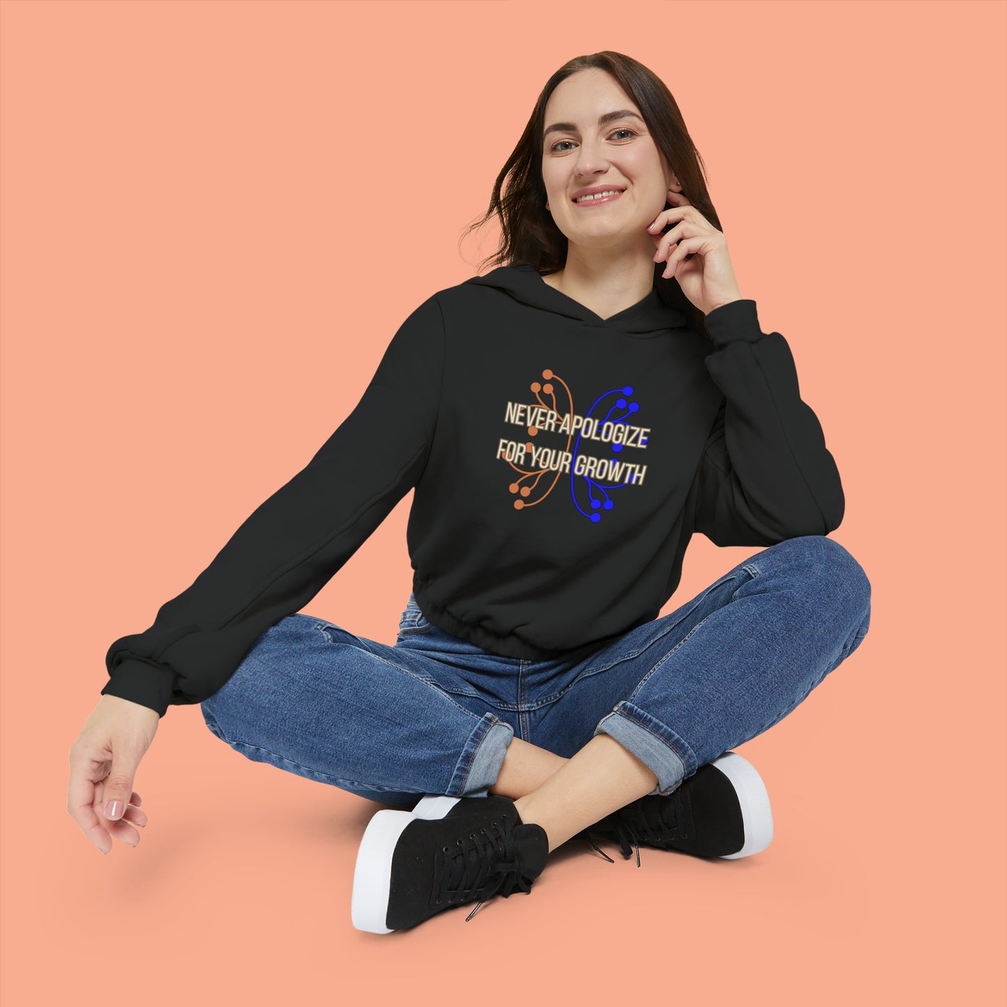 Never apologize for your growth is the message on this Women's Cinched Bottom Hoodie. Go and keep growing!