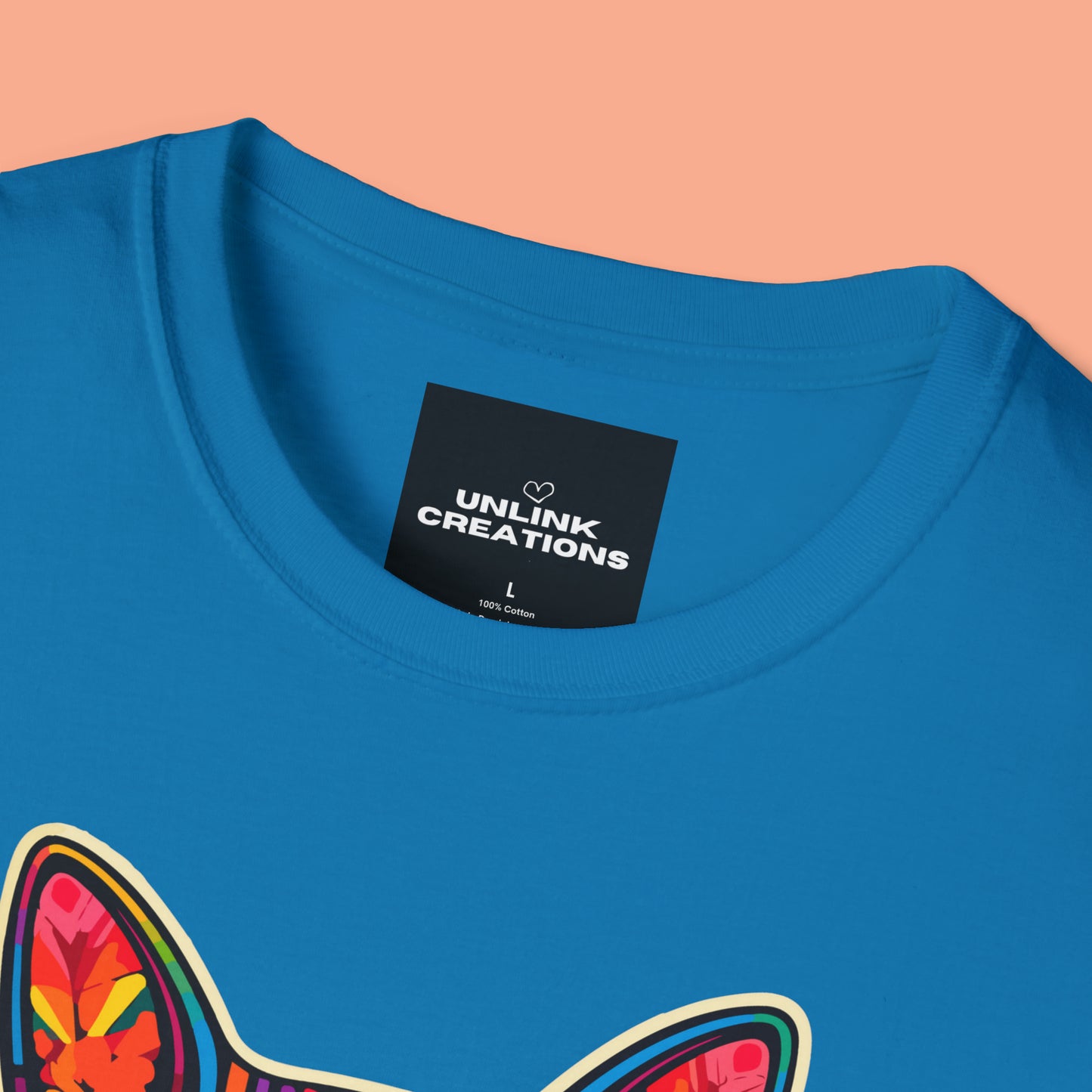 A mesmerizing cat that just pulls you to look into its eyes with “Sassy Cat Club” below it on this Unisex Softstyle T-Shirt.