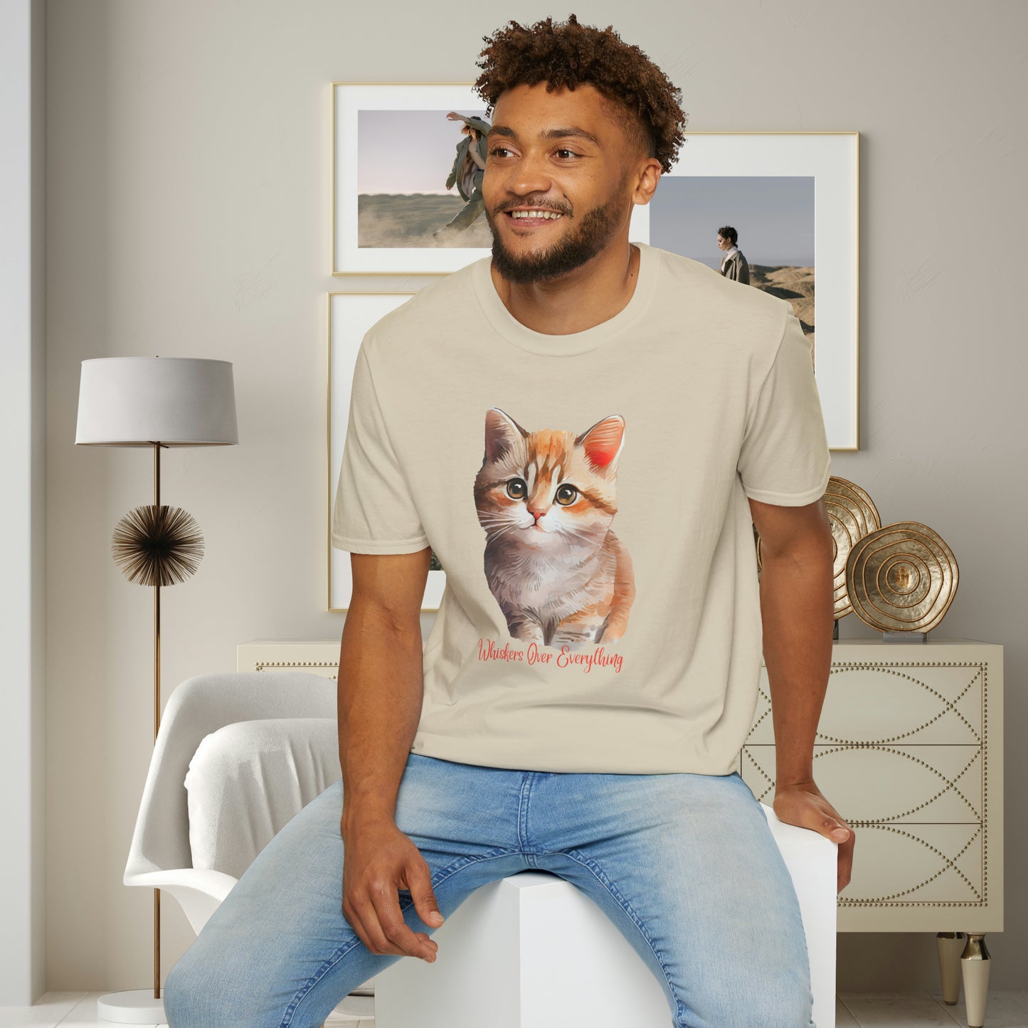 A cute cat with “Whiskers over everything” below it on this Unisex Softstyle T-Shirt. Cat lovers get this.