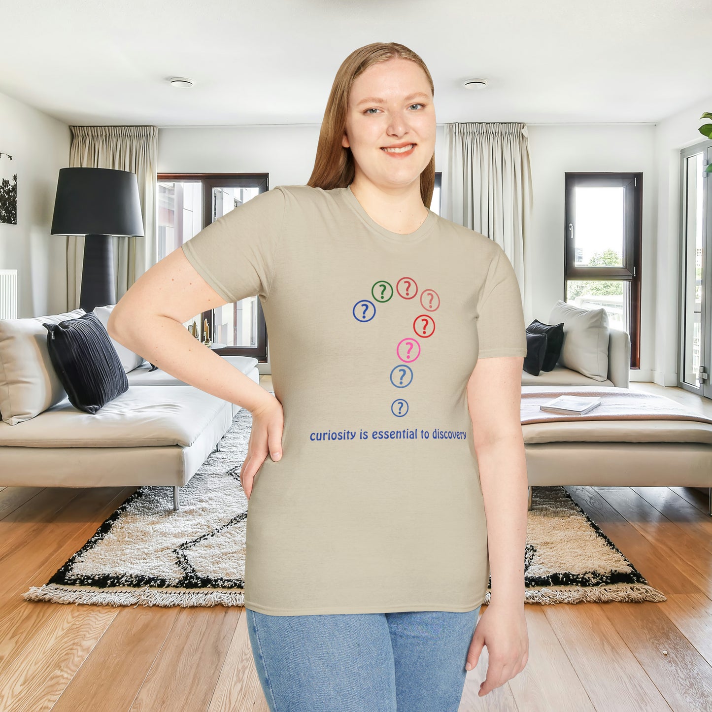 A question mark made of question marks above “curiosity is essential to discovery” message design on this Unisex Softstyle T-Shirt design.