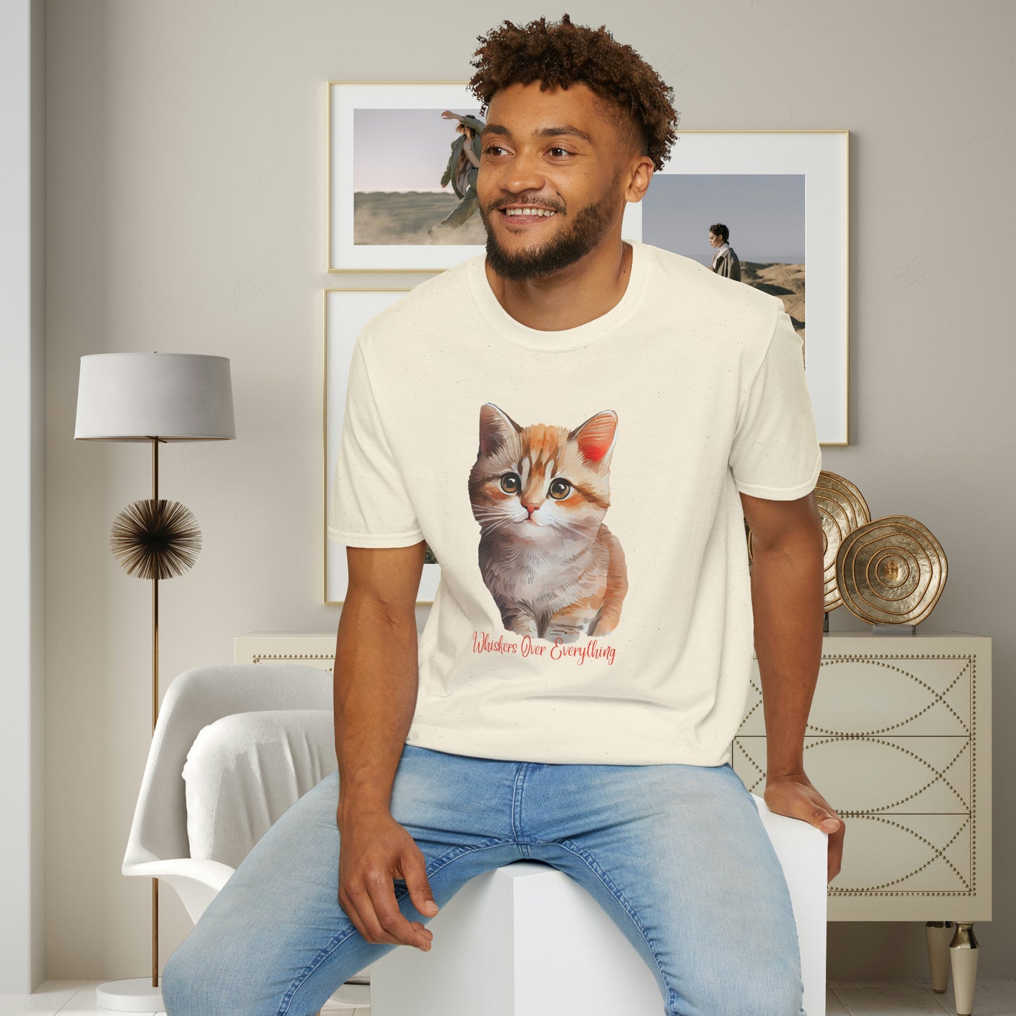 A cute cat with “Whiskers over everything” below it on this Unisex Softstyle T-Shirt. Cat lovers get this.