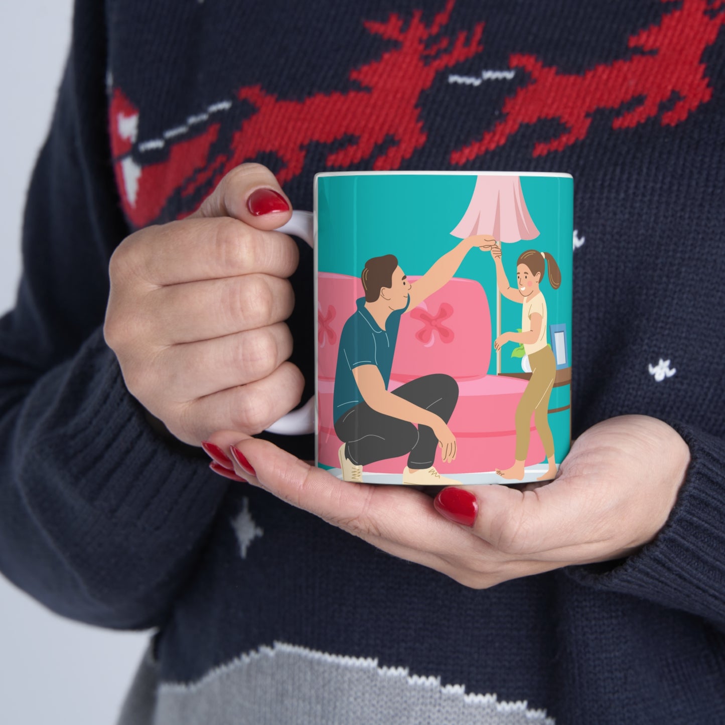 “BEST DAD EVER” on one side and dad dancing with his kid. Part of several mugs to choose from depending on what resonates with you.