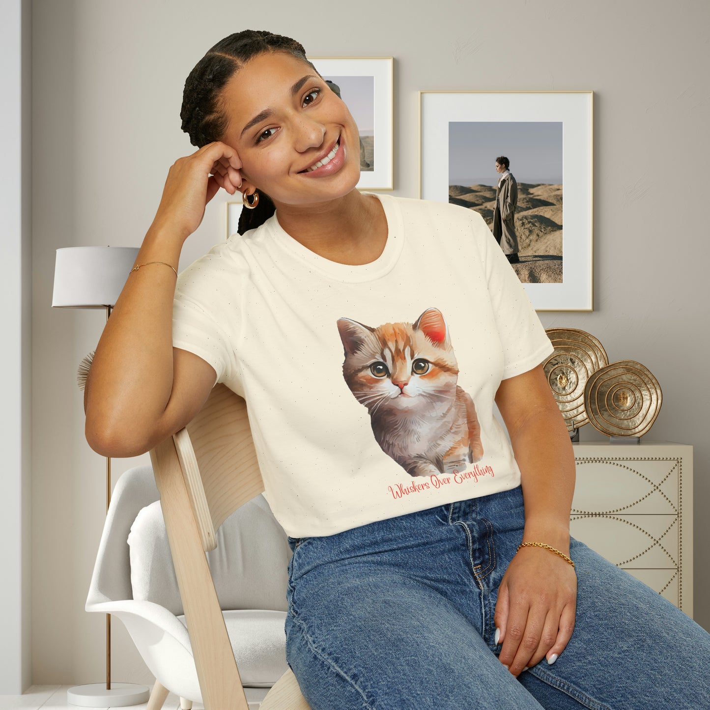 A cute cat with “Whiskers over everything” below it on this Unisex Softstyle T-Shirt. Cat lovers get this.