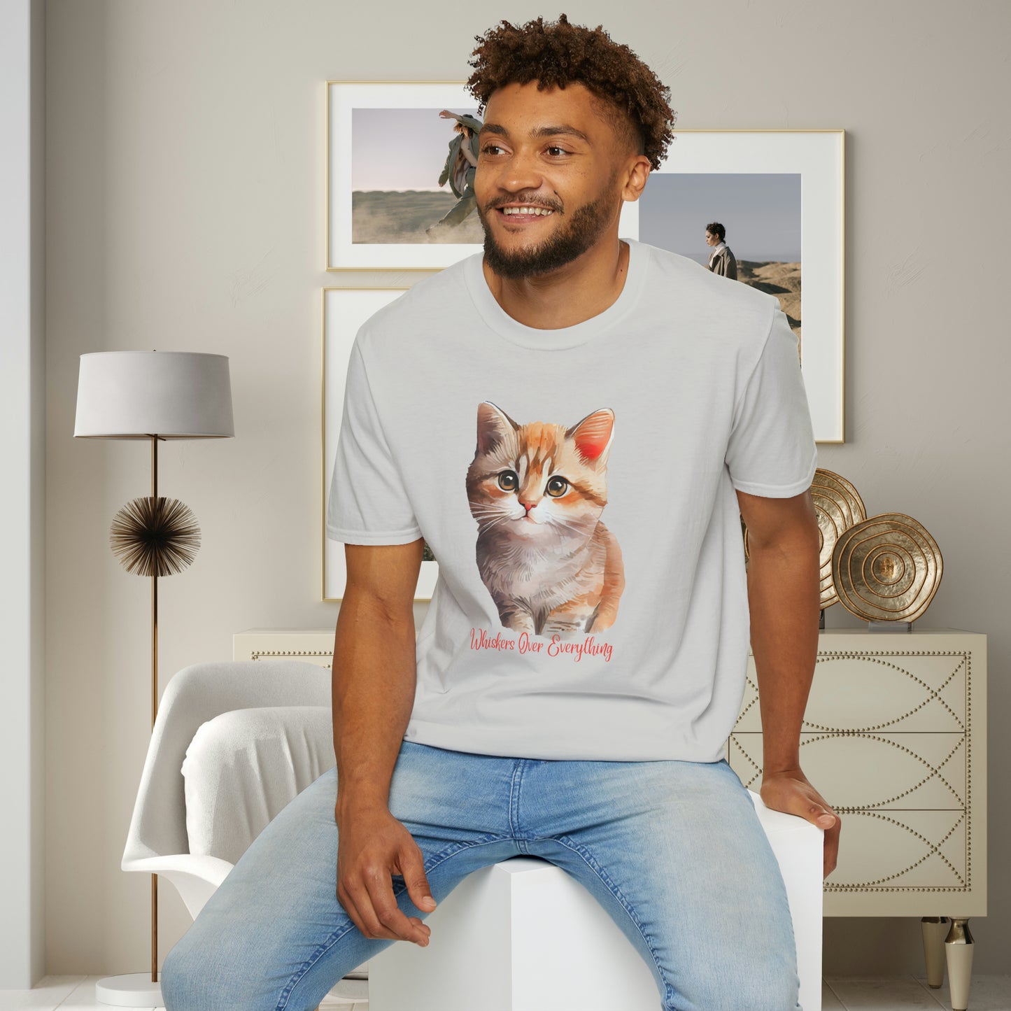 A cute cat with “Whiskers over everything” below it on this Unisex Softstyle T-Shirt. Cat lovers get this.