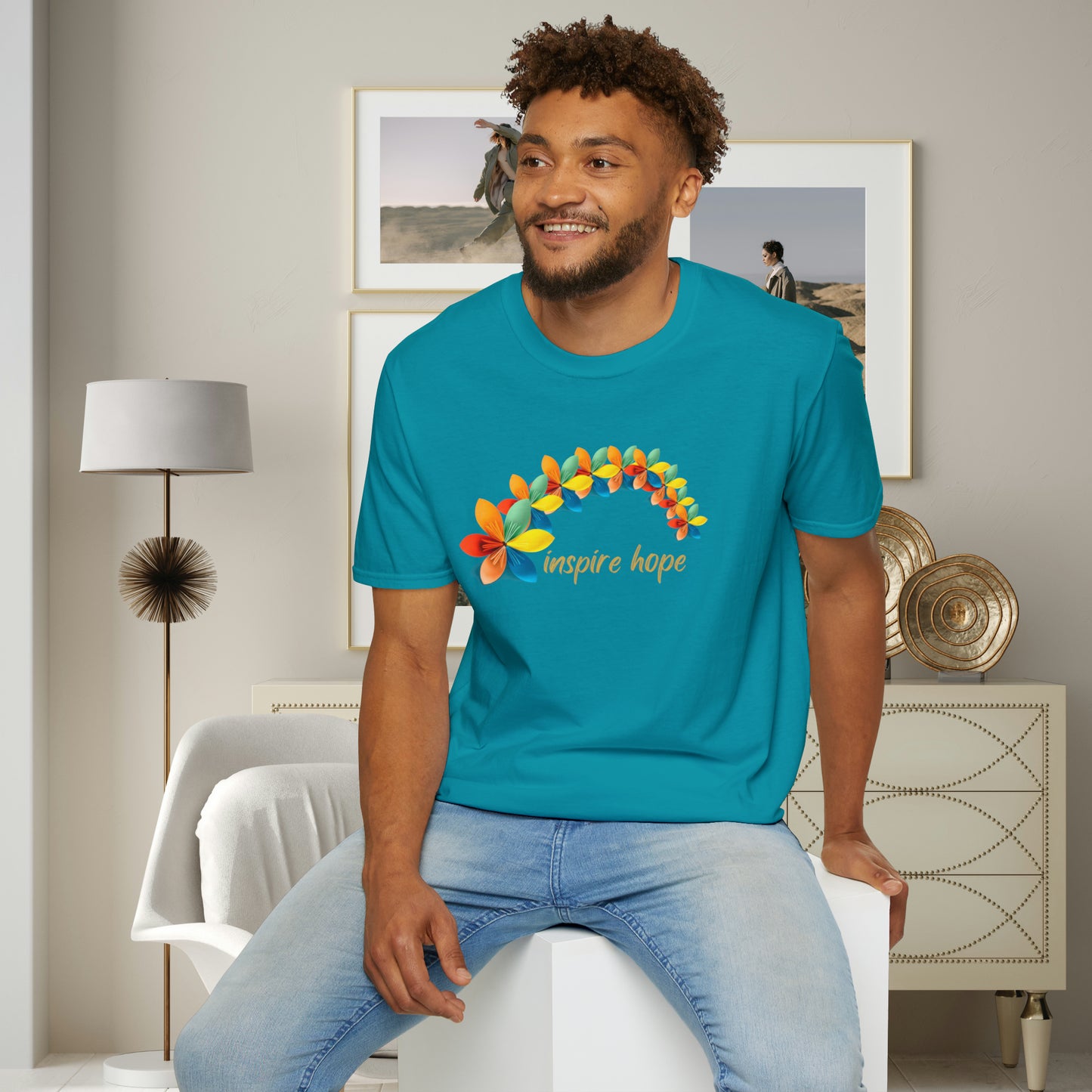A beautiful origami style flowers in rainbow formation with “inspire hope” below it. We find hope in each other, that is part of our humanity. Be that inspiration, one person at a time. This is a Unisex Softstyle T-Shirt.