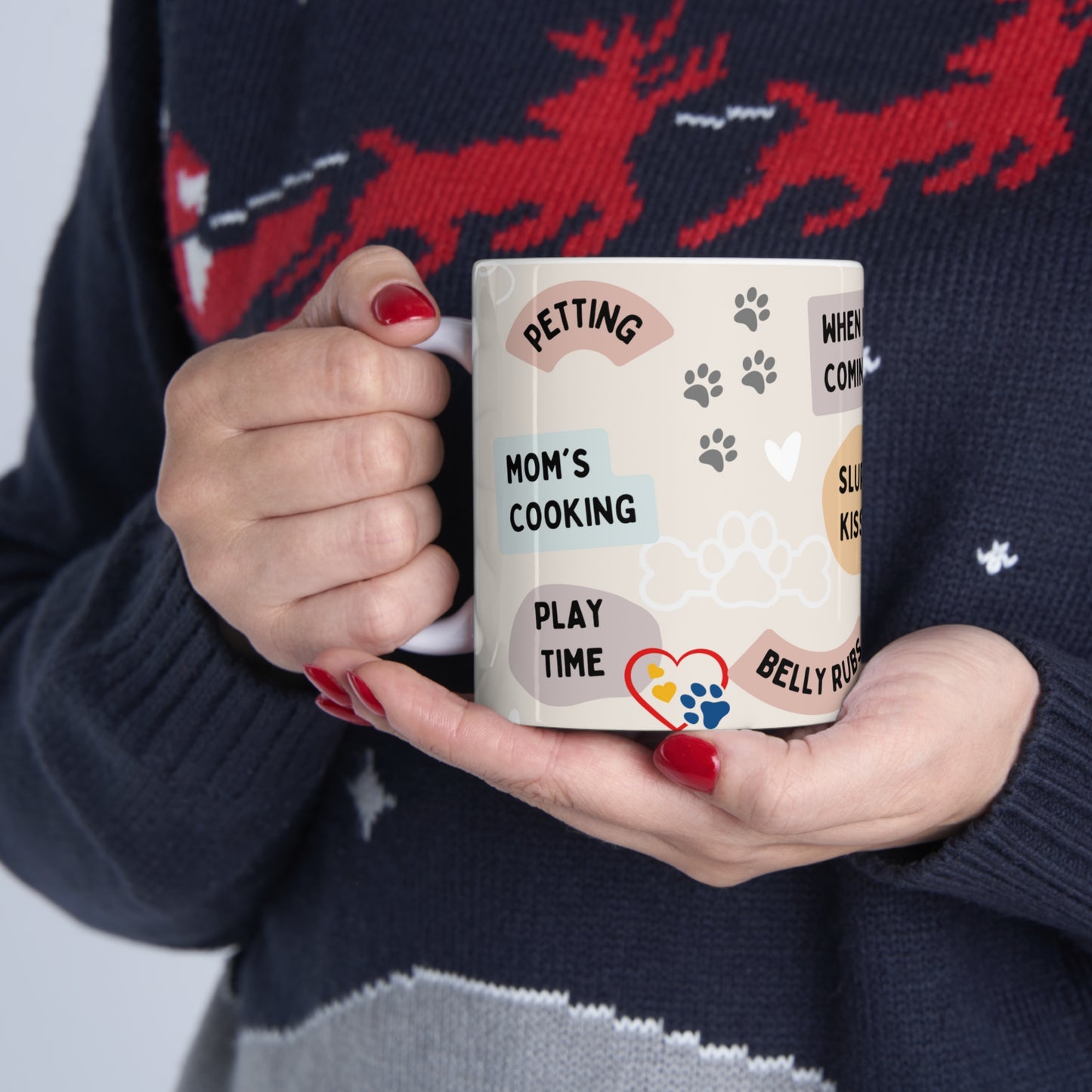 A coffee cup perfect for the Dog Mama full of their furry baby’s favorite things like play time, petting, Mom’s cooking, etc. We love our doggies!