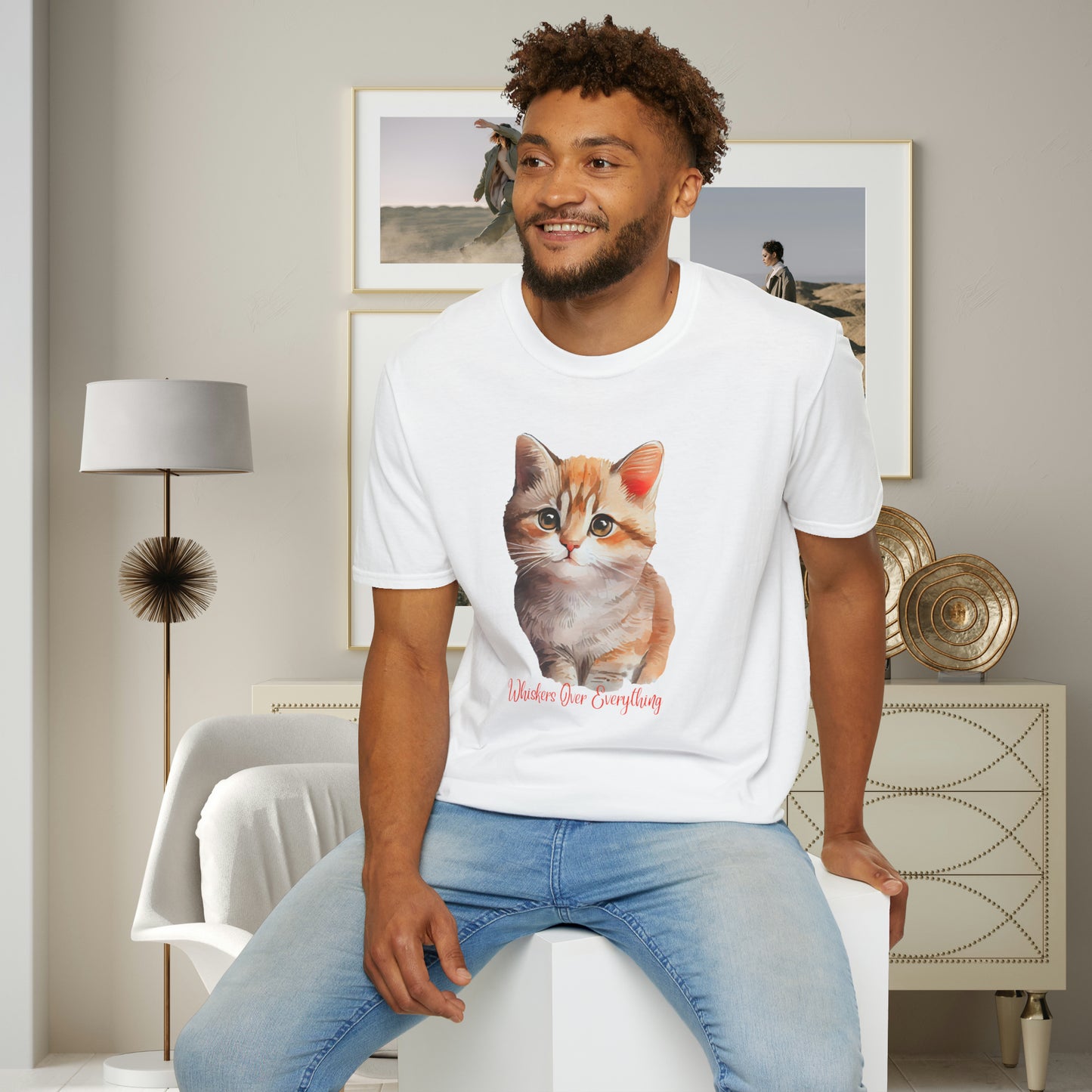 A cute cat with “Whiskers over everything” below it on this Unisex Softstyle T-Shirt. Cat lovers get this.