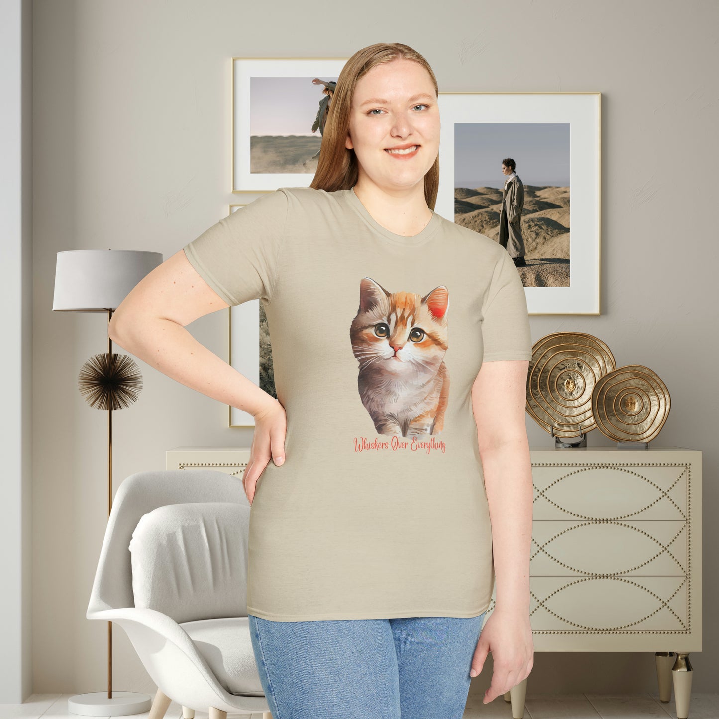 A cute cat with “Whiskers over everything” below it on this Unisex Softstyle T-Shirt. Cat lovers get this.