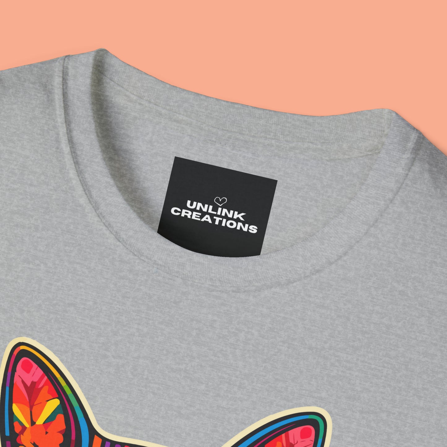 A mesmerizing cat that just pulls you to look into its eyes with “Sassy Cat Club” below it on this Unisex Softstyle T-Shirt.
