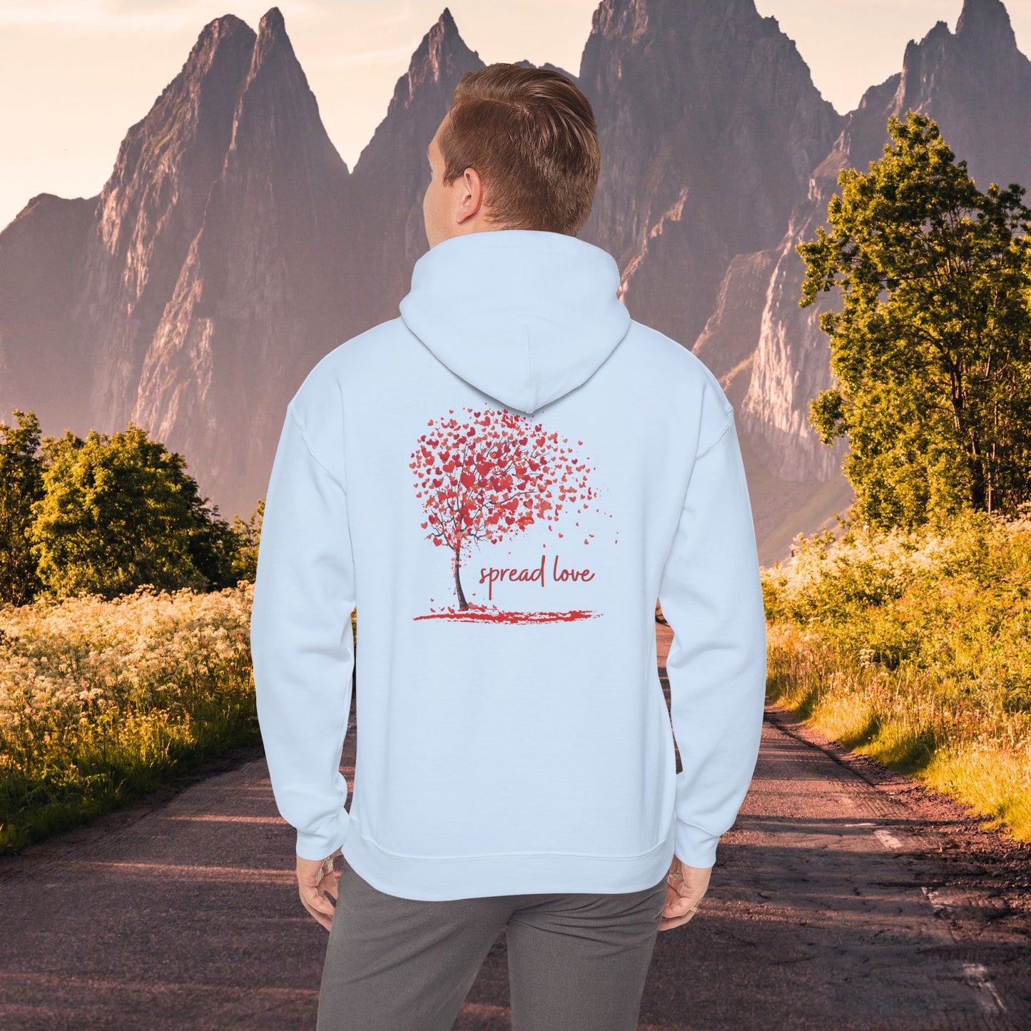 Spread love-heart filled tree Heavy Blend™ Hooded Sweatshirt