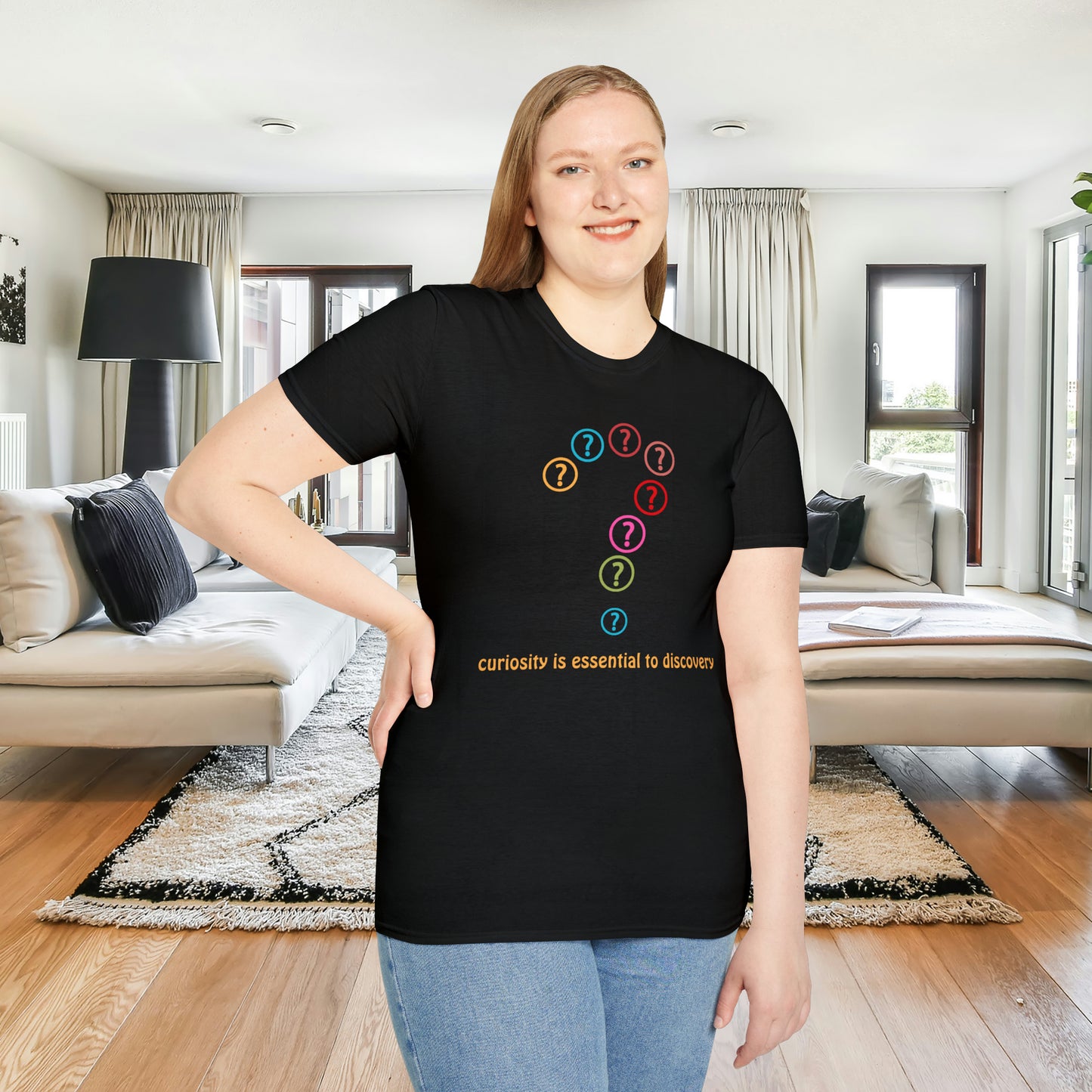 A question mark made of question marks above “curiosity is essential to discovery” message design on this Unisex Softstyle T-Shirt design.