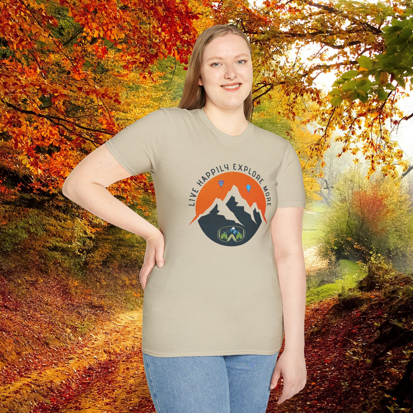 “LIVE HAPPILY EXPLORE MORE” message on this mountain sports inspired Unisex Softstyle T-Shirt.