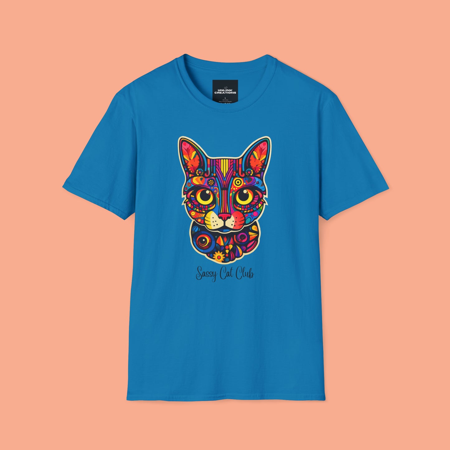 A mesmerizing cat that just pulls you to look into its eyes with “Sassy Cat Club” below it on this Unisex Softstyle T-Shirt.