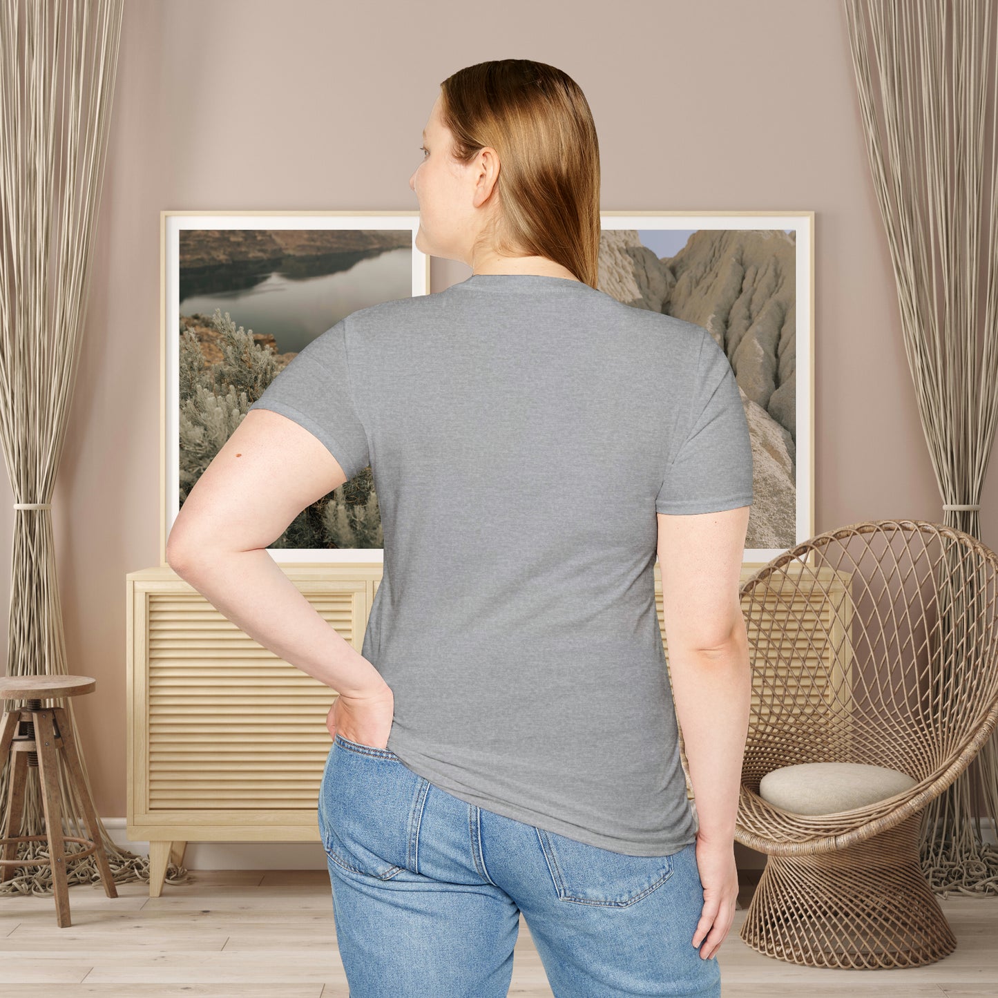 “FOCUS on the good” above a multicolored heart on this Unisex Softstyle T-Shirt.