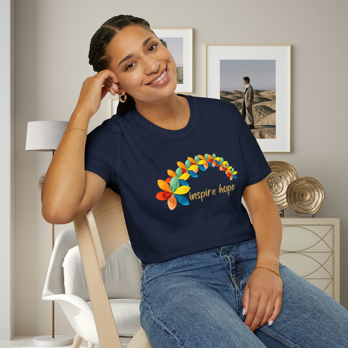A beautiful origami style flowers in rainbow formation with “inspire hope” below it. We find hope in each other, that is part of our humanity. Be that inspiration, one person at a time. This is a Unisex Softstyle T-Shirt.