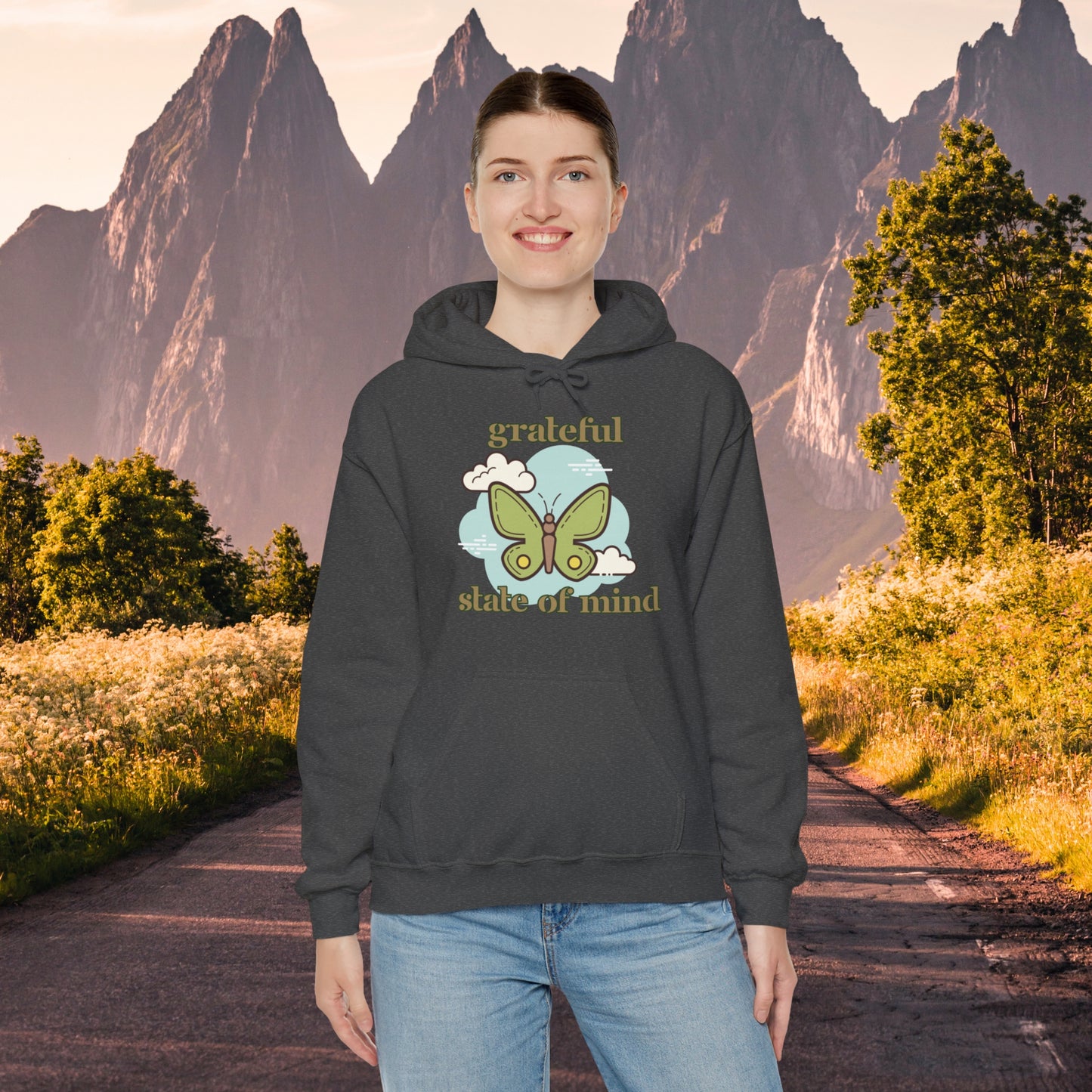 Grateful state of mind around a simple butterfly design on this Unisex Heavy Blend™ Hooded Sweatshirt