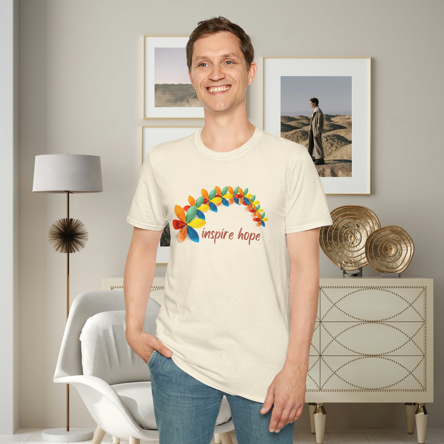 A beautiful origami style flowers in rainbow formation with “inspire hope” below it. We find hope in each other, that is part of our humanity. Be that inspiration, one person at a time. This is a Unisex Softstyle T-Shirt.