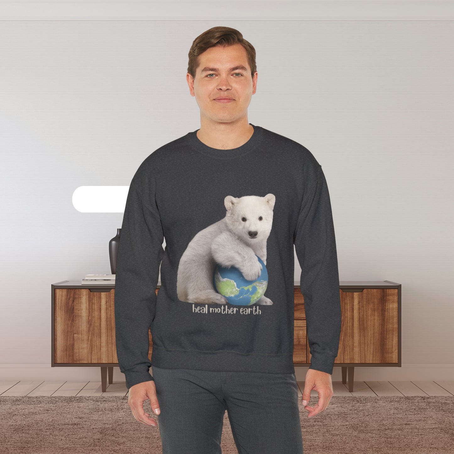 Adorable polar bear cub hugging Mother Earth and asks us to “Heal Mother Earth. ! We can do it together! Give the gift of this Unisex Heavy Blend™ Crewneck Sweatshirt or get one for yourself.