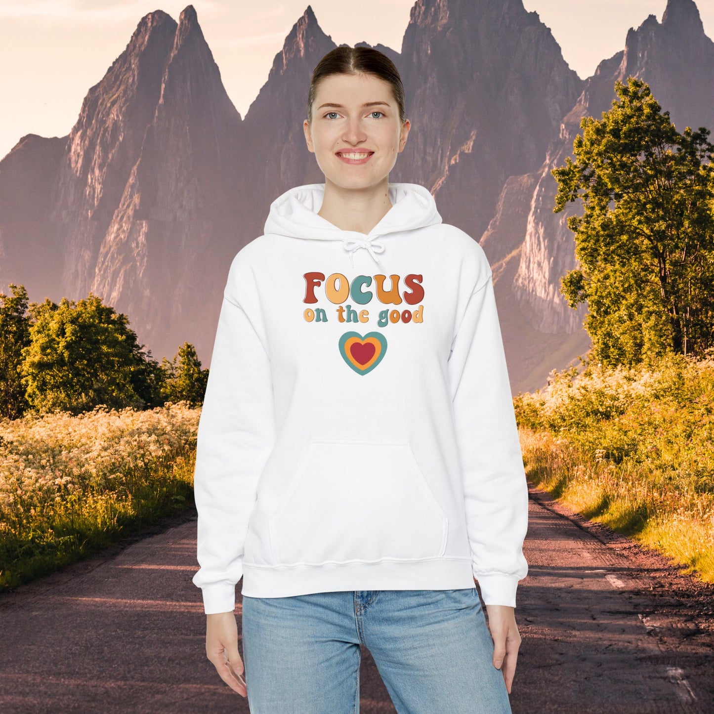 A colorful Focus on the good message on this Unisex Heavy Blend™ Hooded Sweatshirt