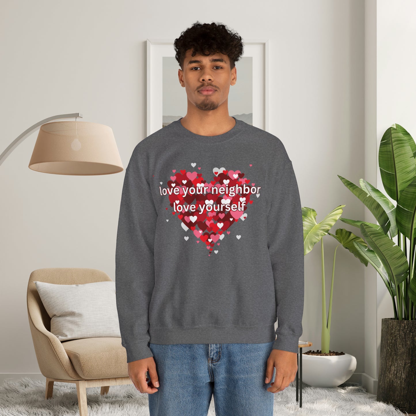 “love your neighbor love yourself” on top of a beautiful heart of hearts. Give the gift of this Unisex Heavy Blend™ Crewneck Sweatshirt or get one for yourself.