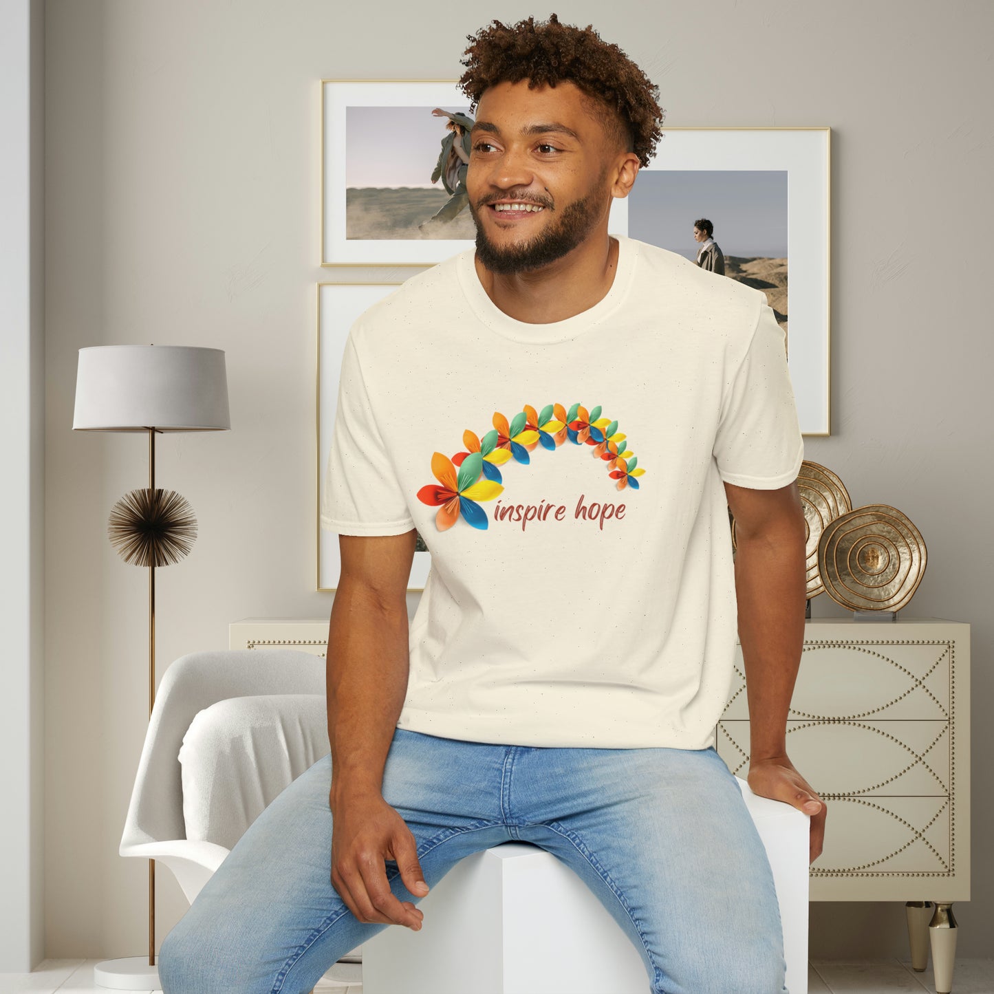 A beautiful origami style flowers in rainbow formation with “inspire hope” below it. We find hope in each other, that is part of our humanity. Be that inspiration, one person at a time. This is a Unisex Softstyle T-Shirt.