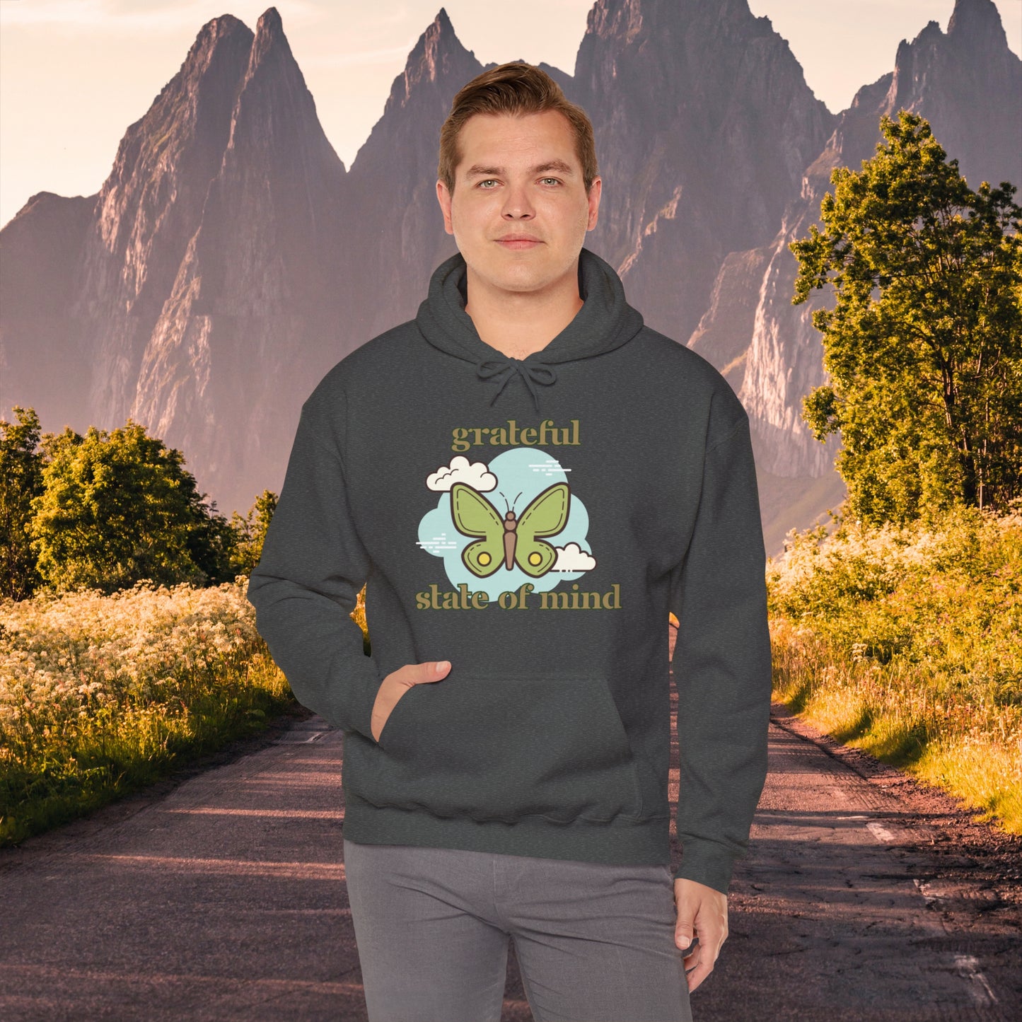 Grateful state of mind around a simple butterfly design on this Unisex Heavy Blend™ Hooded Sweatshirt