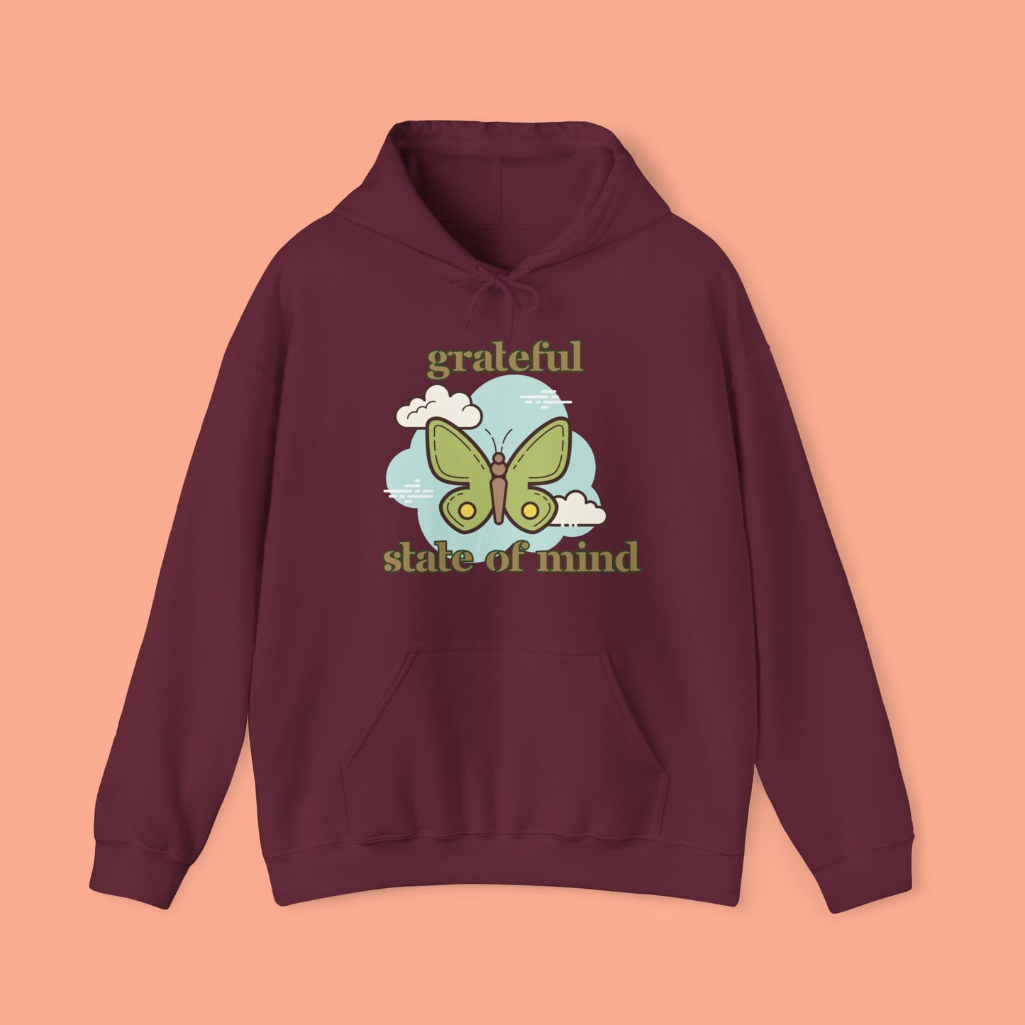 Grateful state of mind around a simple butterfly design on this Unisex Heavy Blend™ Hooded Sweatshirt