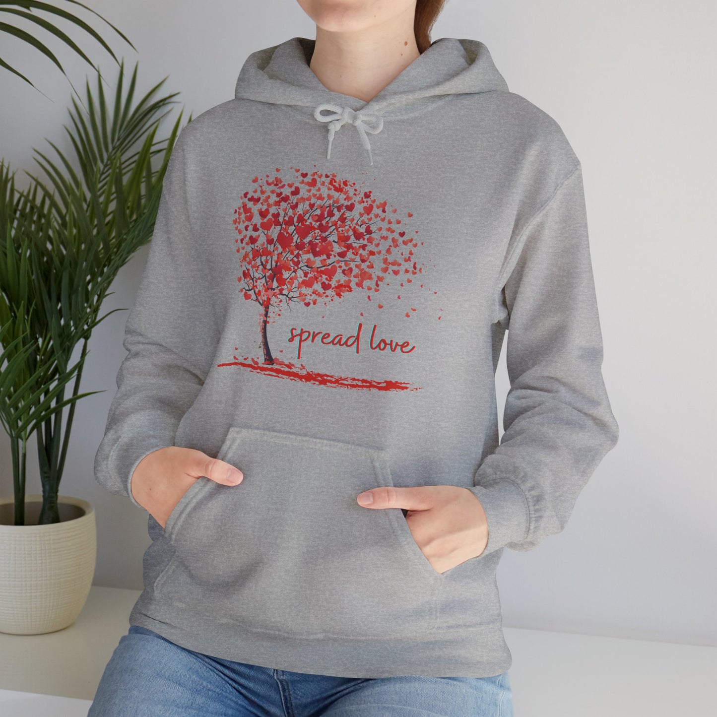 Spread love is the message on this heart filled tree designed Unisex Heavy Blend™ Hooded Sweatshirt