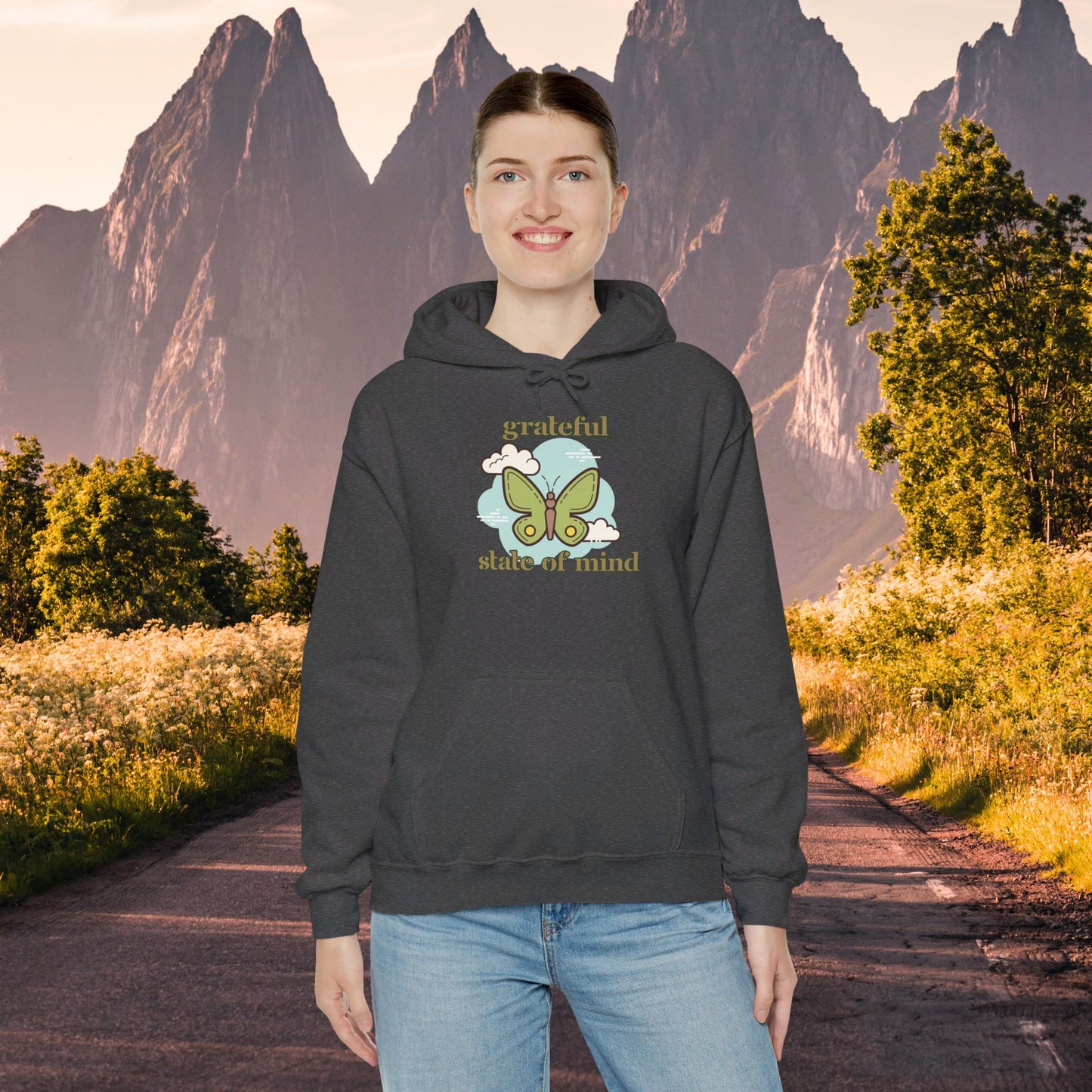 Grateful state of mind around a simple butterfly design on this Unisex Heavy Blend™ Hooded Sweatshirt