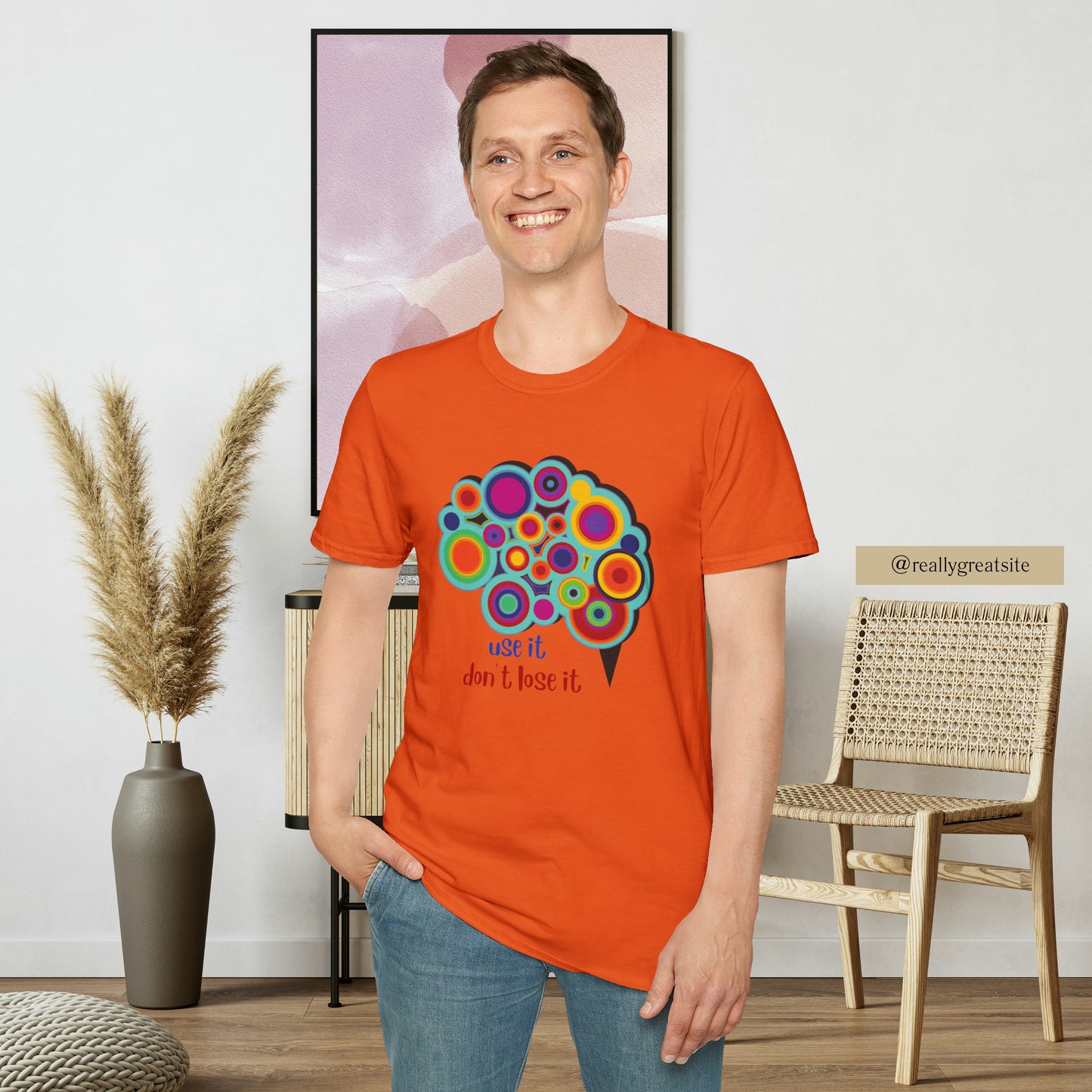 Beautifully designed brain with “use it don’t lose it” message below it on this Unisex Softstyle T-Shirt.