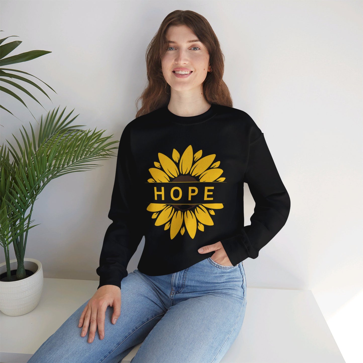 Beautiful sunflower with to inspire  “HOPE” comfy sweatshirt. Give the gift of this Unisex Heavy Blend™ Crewneck Sweatshirt or get one for yourself.