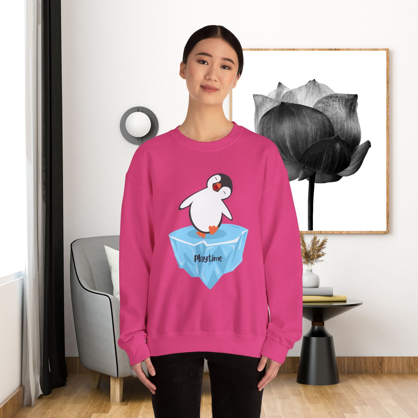 Playtime! Cute and happy penguin on an iceberg design. Give the gift of this Unisex Heavy Blend™ Crewneck Sweatshirt or get one for yourself.