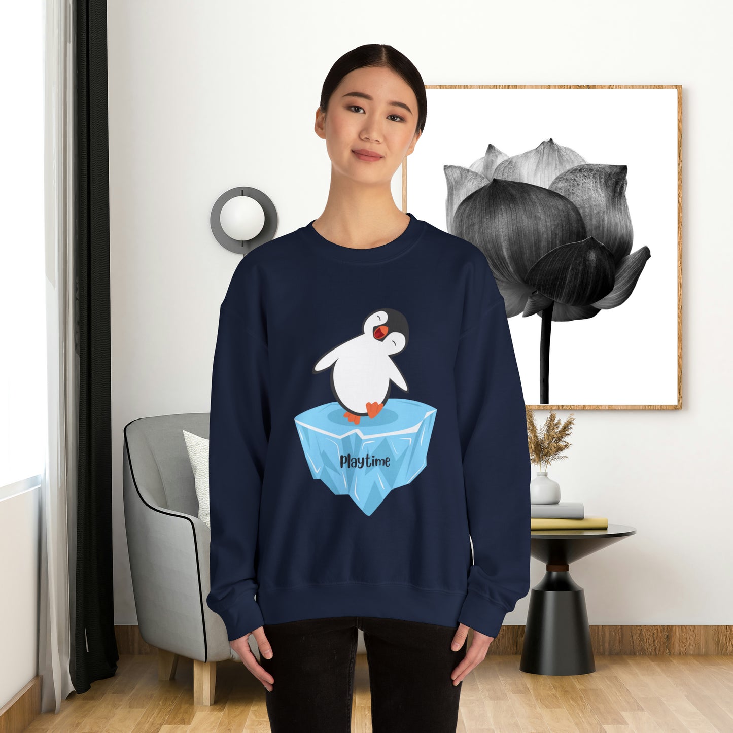 Playtime! Cute and happy penguin on an iceberg design. Give the gift of this Unisex Heavy Blend™ Crewneck Sweatshirt or get one for yourself.