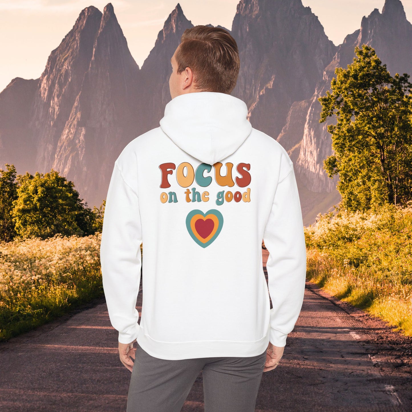 A colorful Focus on the good message on this Unisex Heavy Blend™ Hooded Sweatshirt