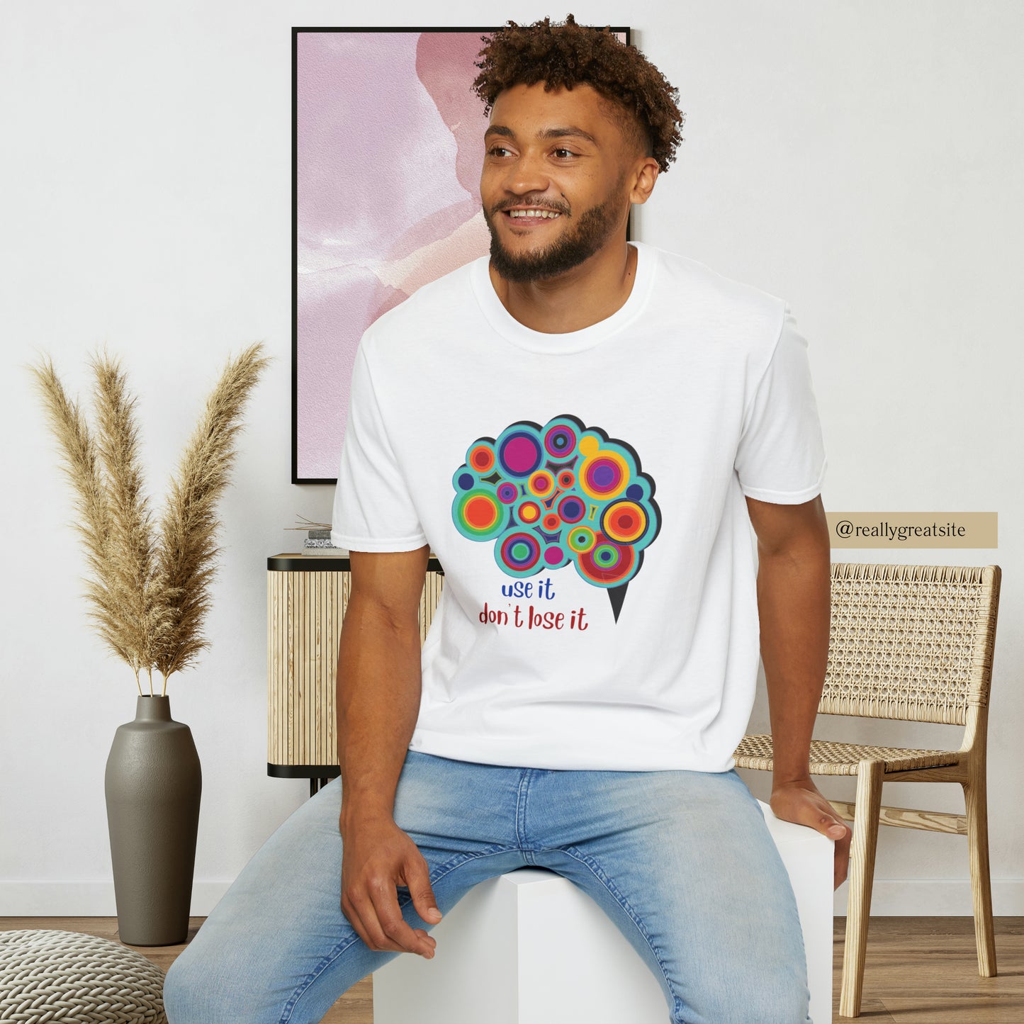 Beautifully designed brain with “use it don’t lose it” message below it on this Unisex Softstyle T-Shirt.