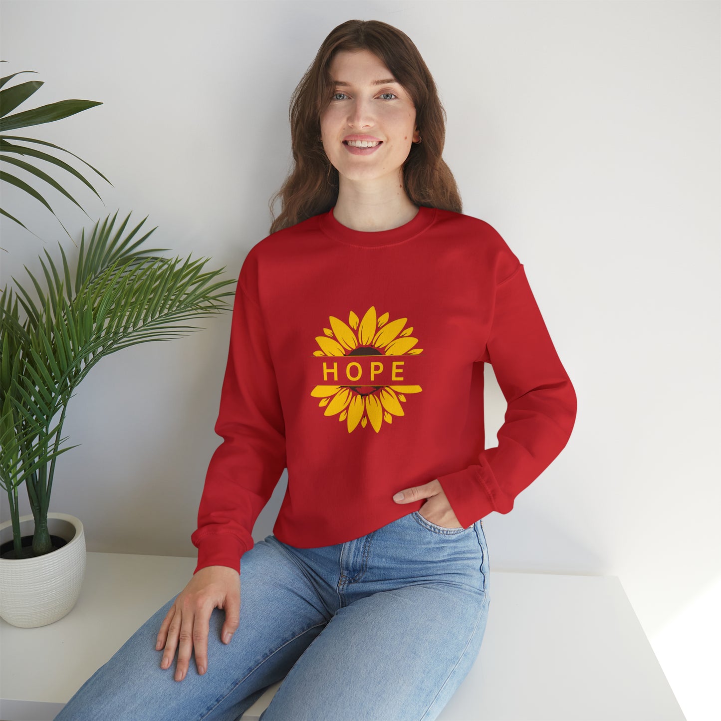 Beautiful sunflower with to inspire  “HOPE” comfy sweatshirt. Give the gift of this Unisex Heavy Blend™ Crewneck Sweatshirt or get one for yourself.